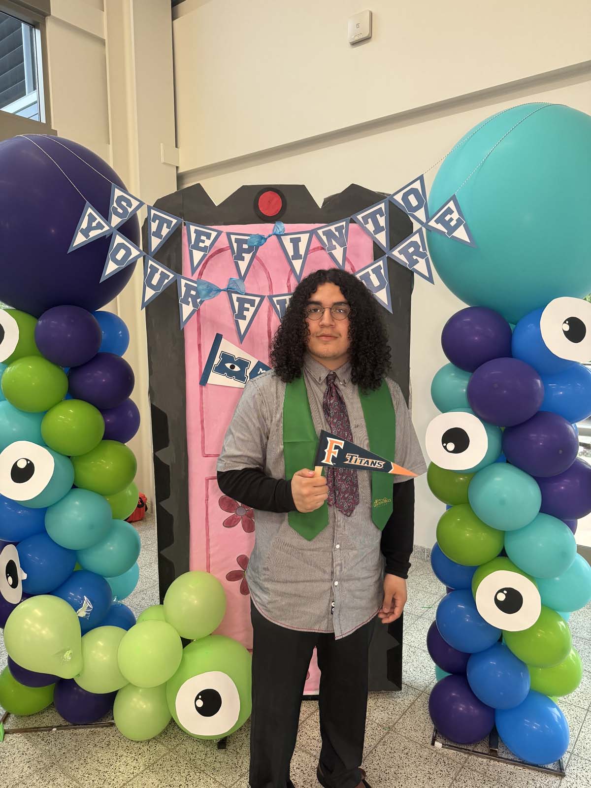 Students attend Transfer Dinner celebration with mascot Ryker.