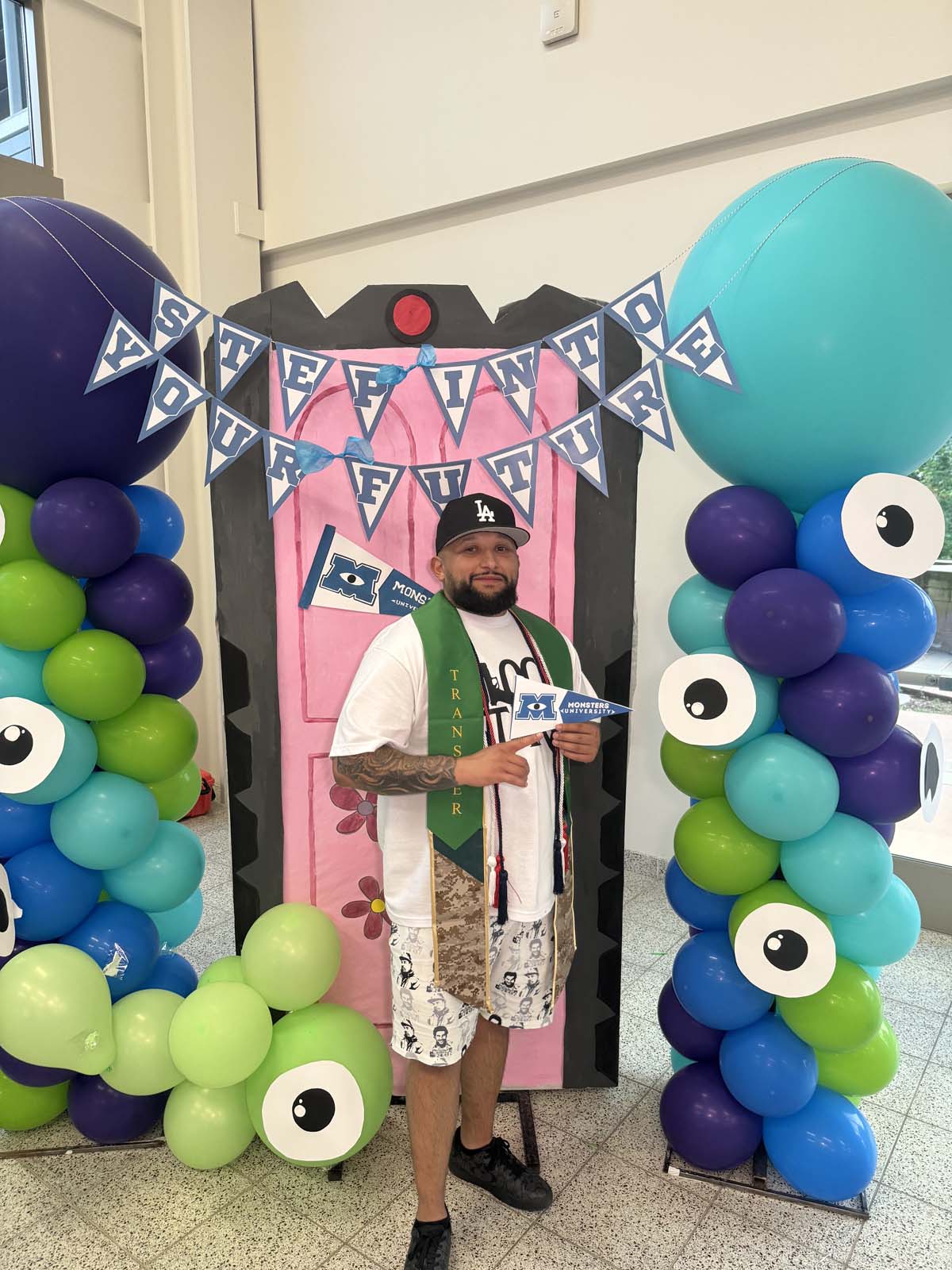 Students attend Transfer Dinner celebration with mascot Ryker.