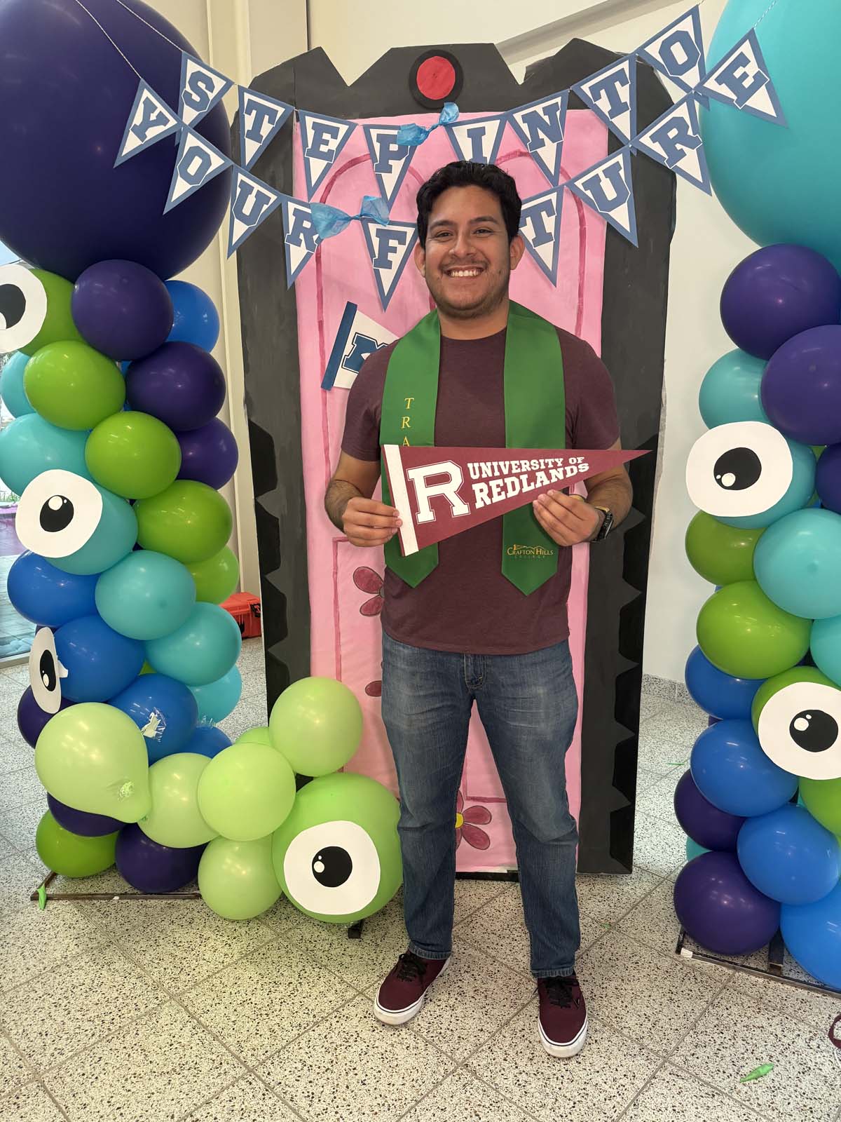 Students attend Transfer Dinner celebration with mascot Ryker.