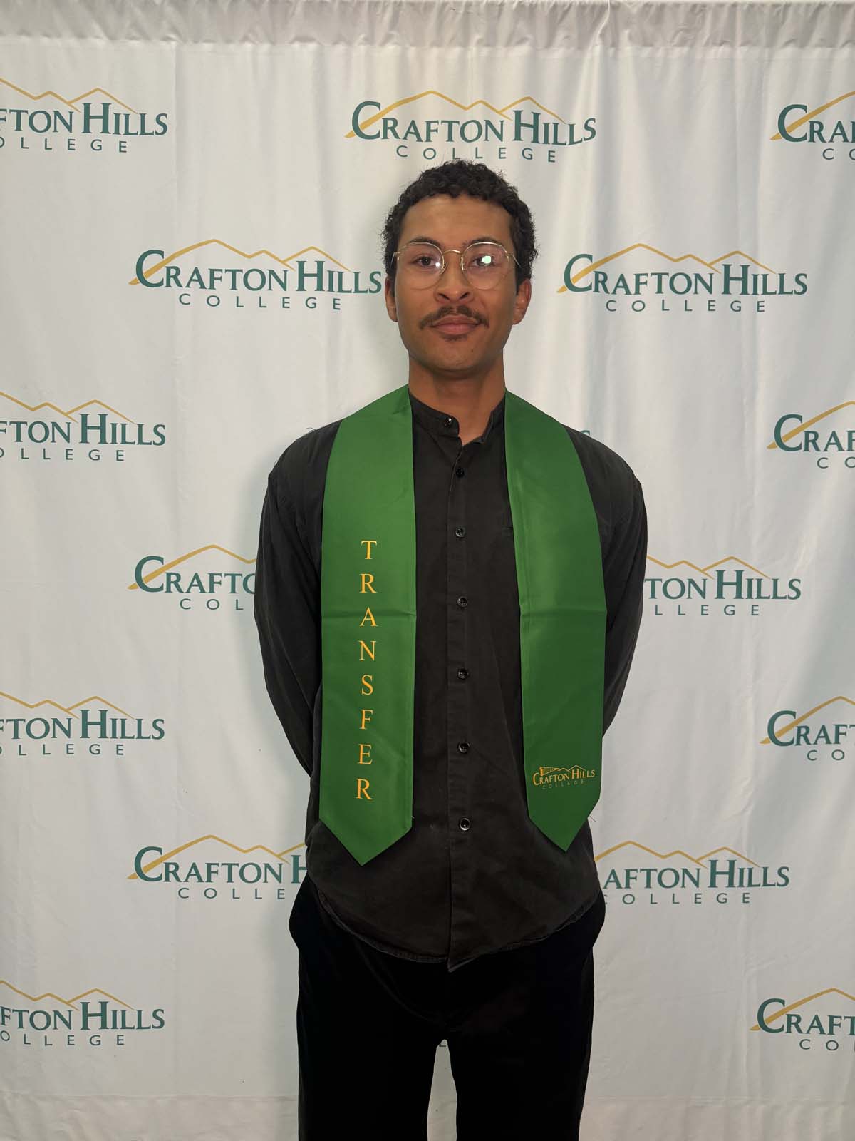 Students attend Transfer Dinner celebration with mascot Ryker.