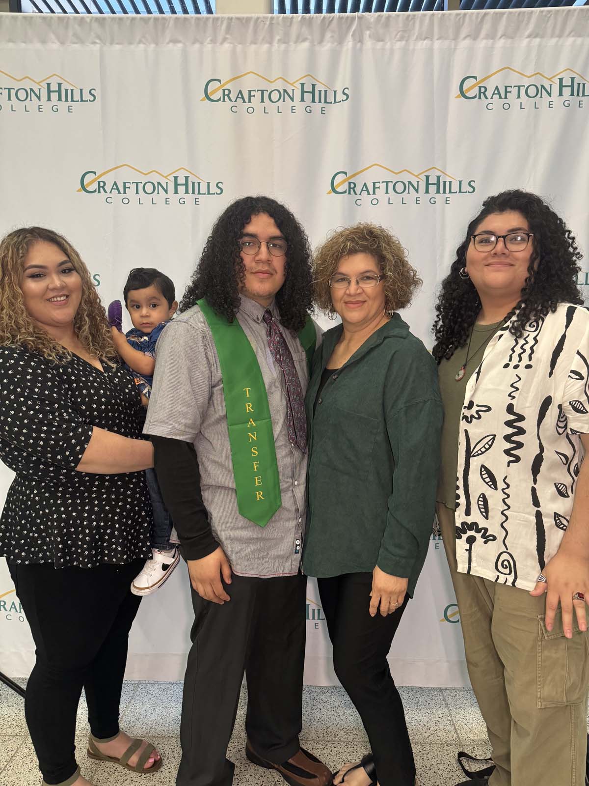 Students attend Transfer Dinner celebration with mascot Ryker.