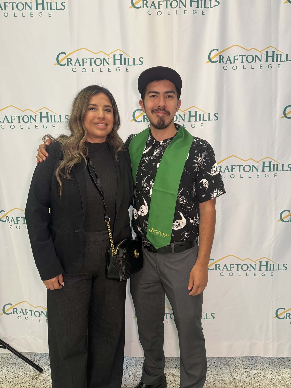 Students attend Transfer Dinner celebration with mascot Ryker.