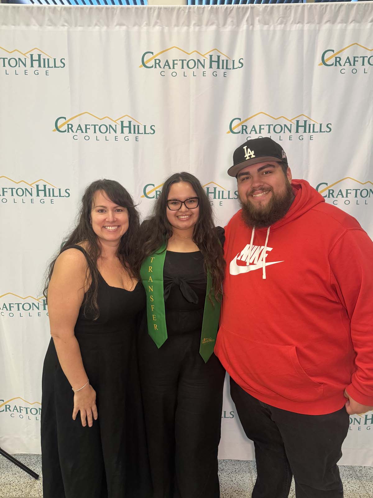 Students attend Transfer Dinner celebration with mascot Ryker.