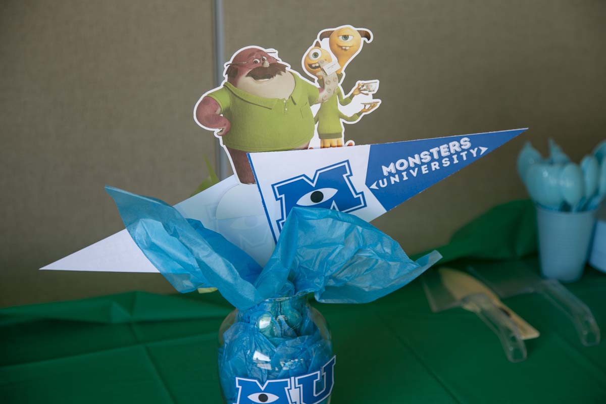 Students attend Transfer Dinner celebration with mascot Ryker.