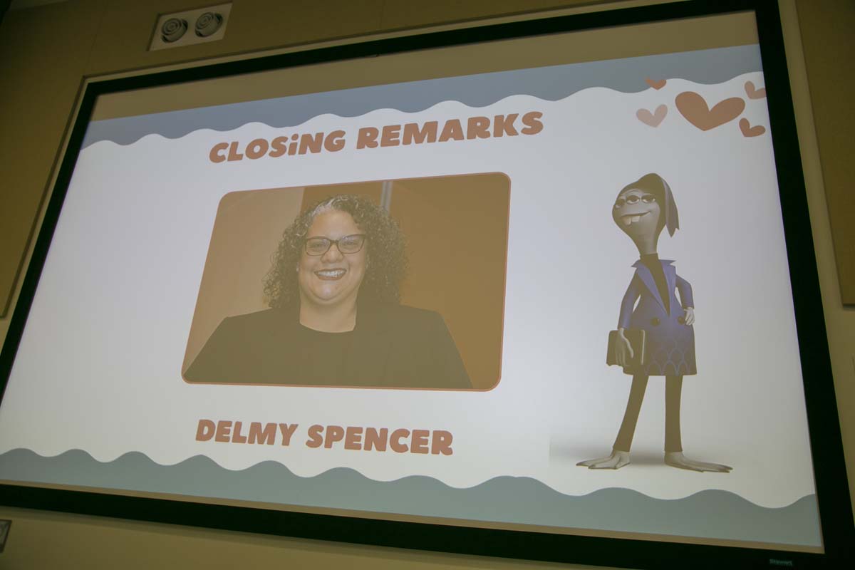 Students attend Transfer Dinner celebration with mascot Ryker.