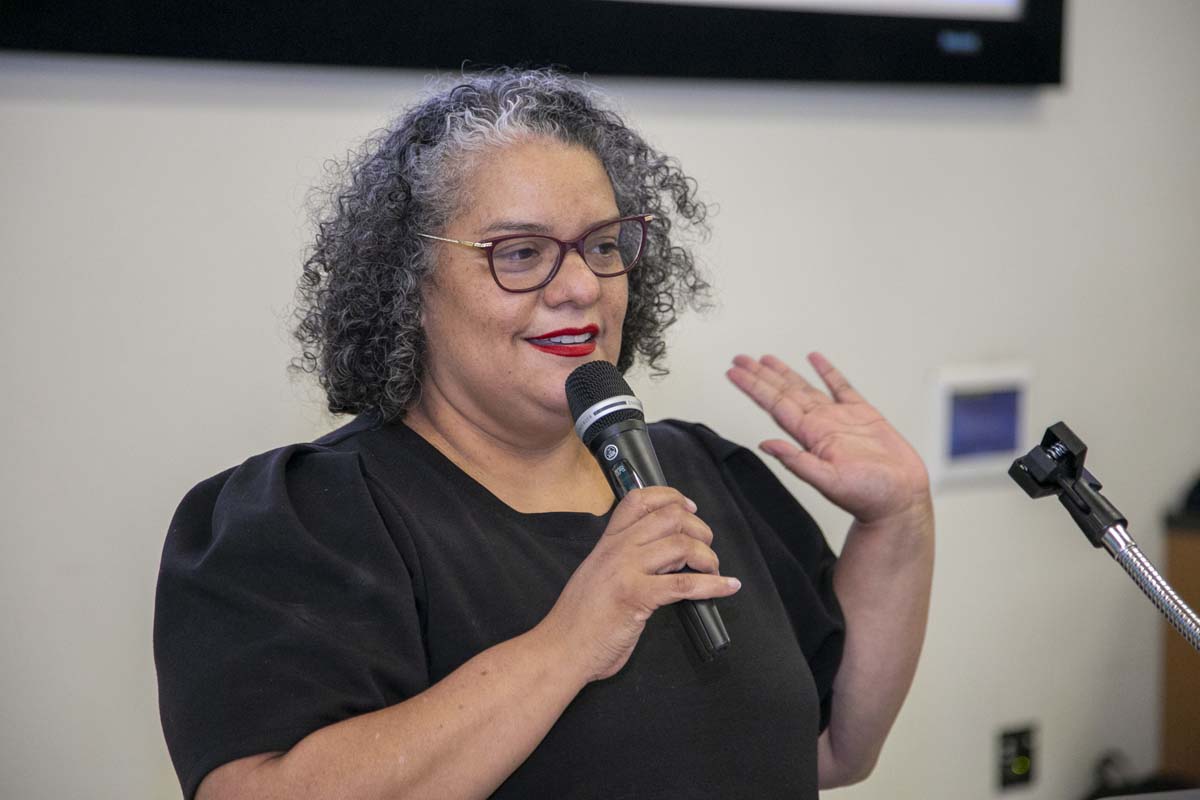 Students attend Transfer Dinner celebration with mascot Ryker.