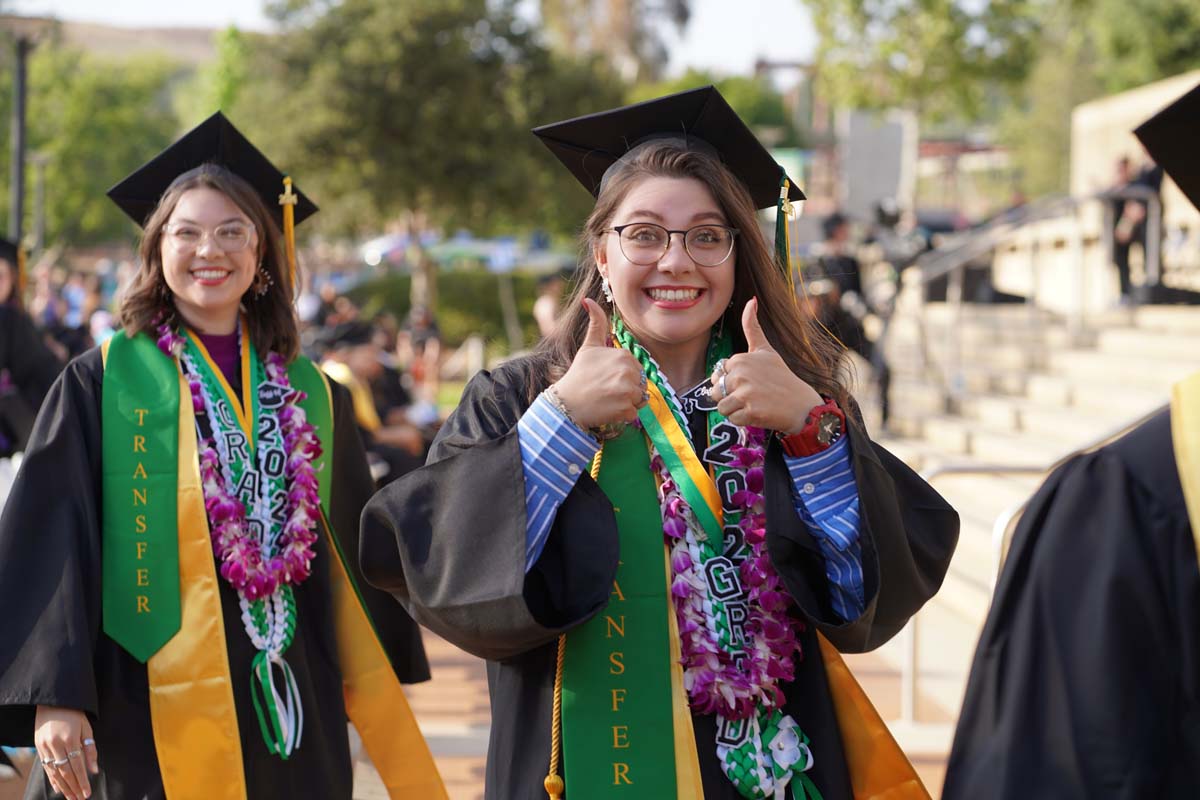 Graduates walk to stage at CHC's Commencement 2024.