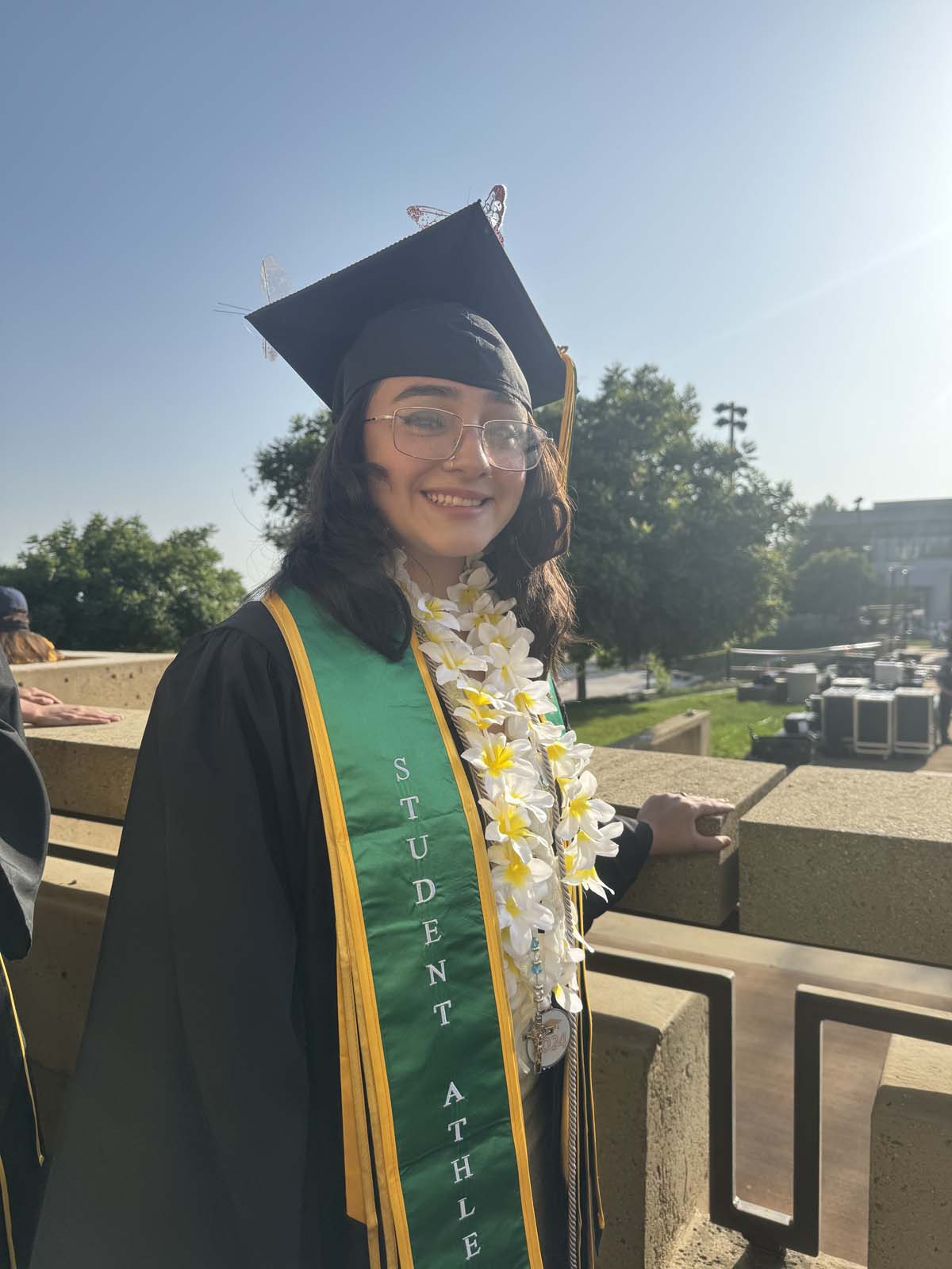 Graduates walk to stage at CHC's Commencement 2024.