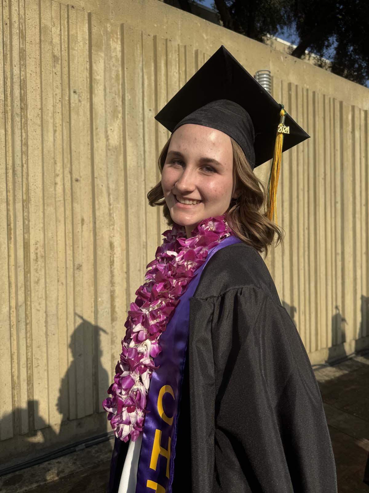 Graduates walk to stage at CHC's Commencement 2024.