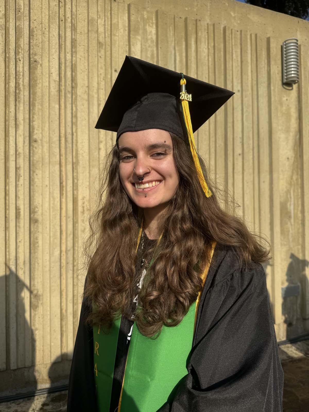 Graduates walk to stage at CHC's Commencement 2024.