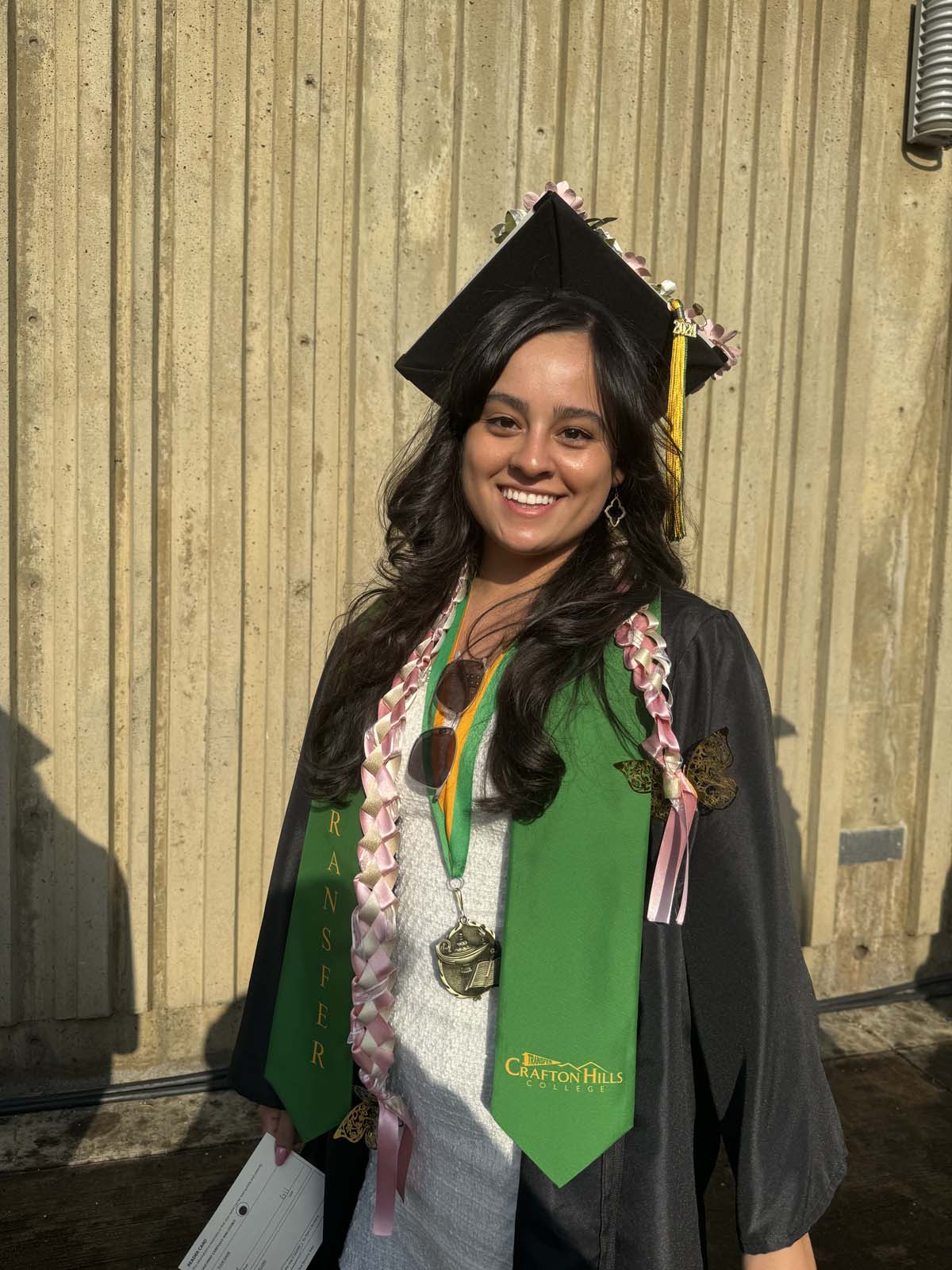 Graduates walk to stage at CHC's Commencement 2024.