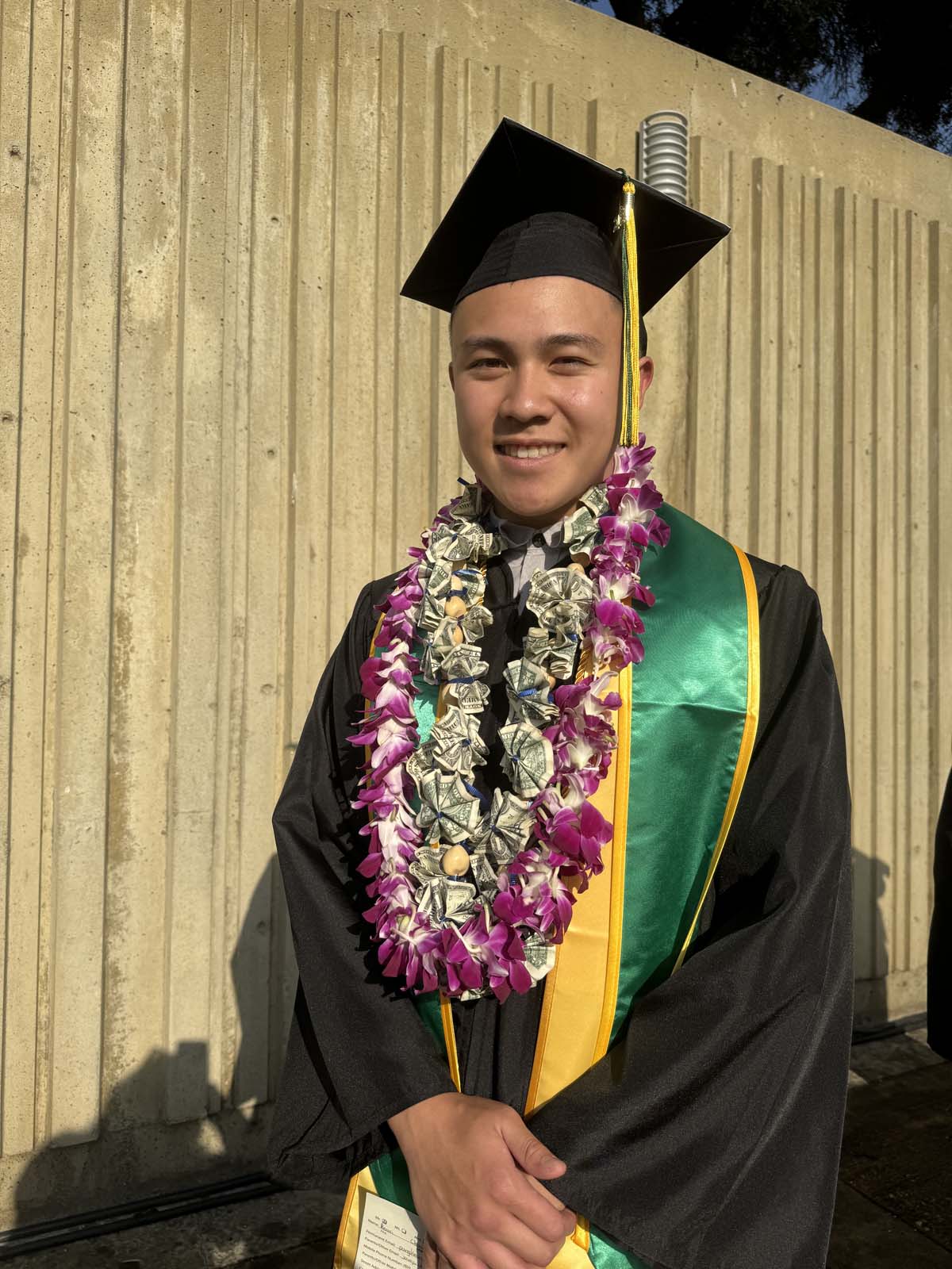 Graduates walk to stage at CHC's Commencement 2024.