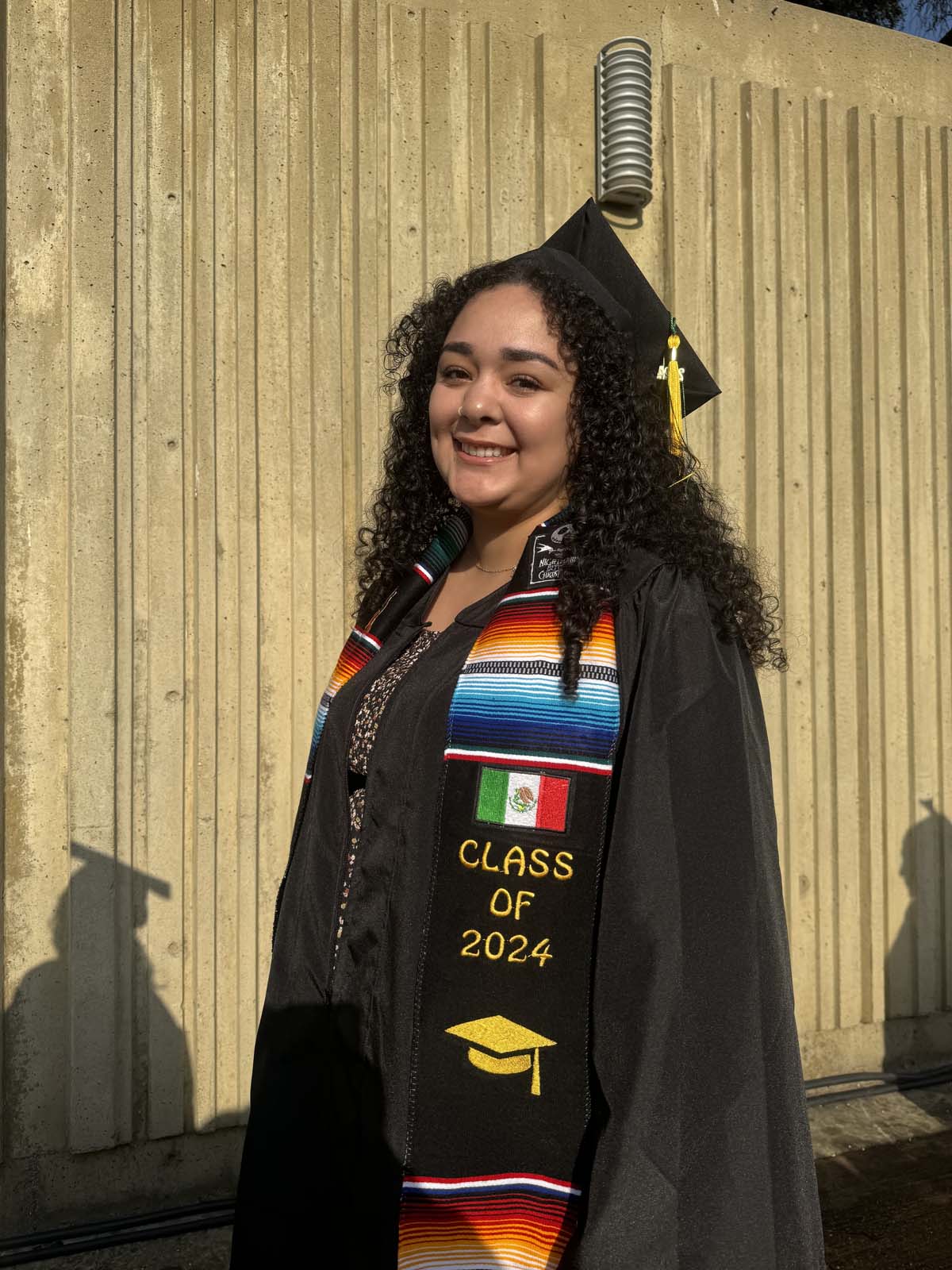 Graduates walk to stage at CHC's Commencement 2024.