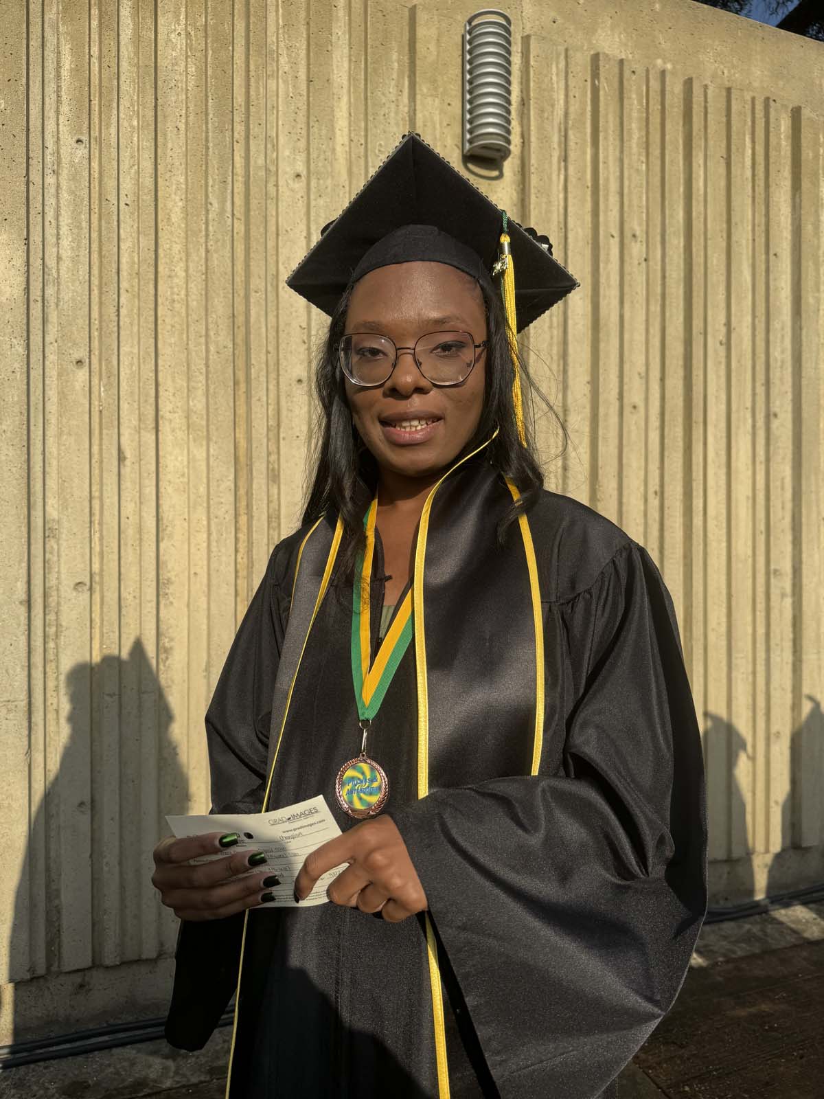 Graduates walk to stage at CHC's Commencement 2024.