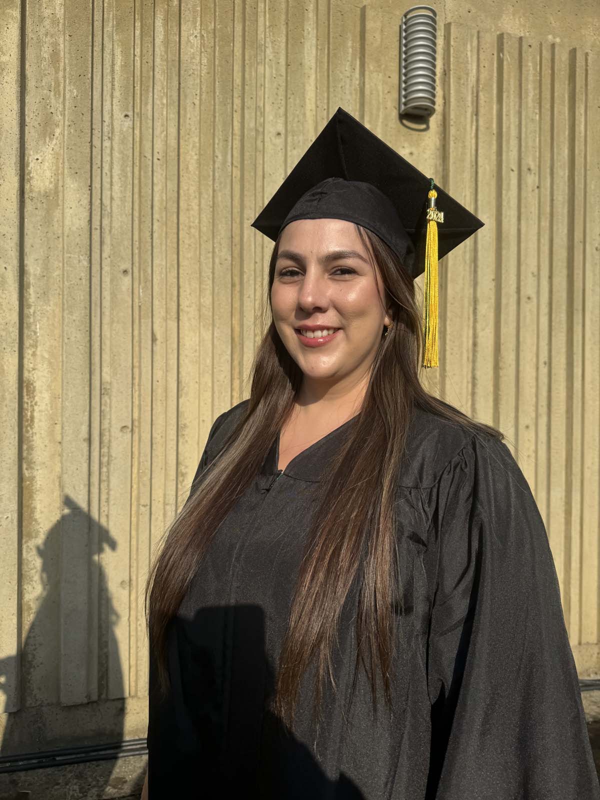 Graduates walk to stage at CHC's Commencement 2024.