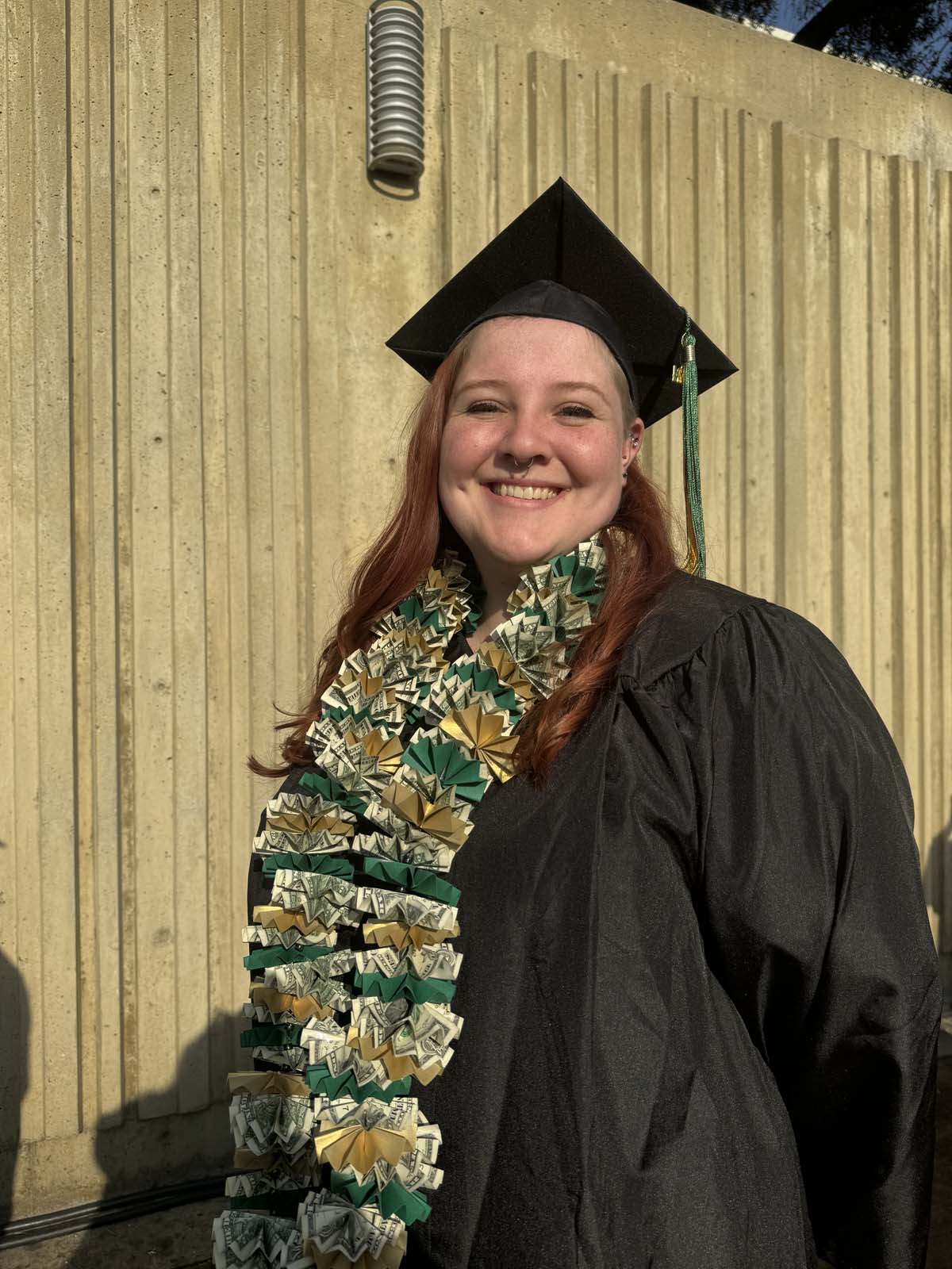 Graduates walk to stage at CHC's Commencement 2024.