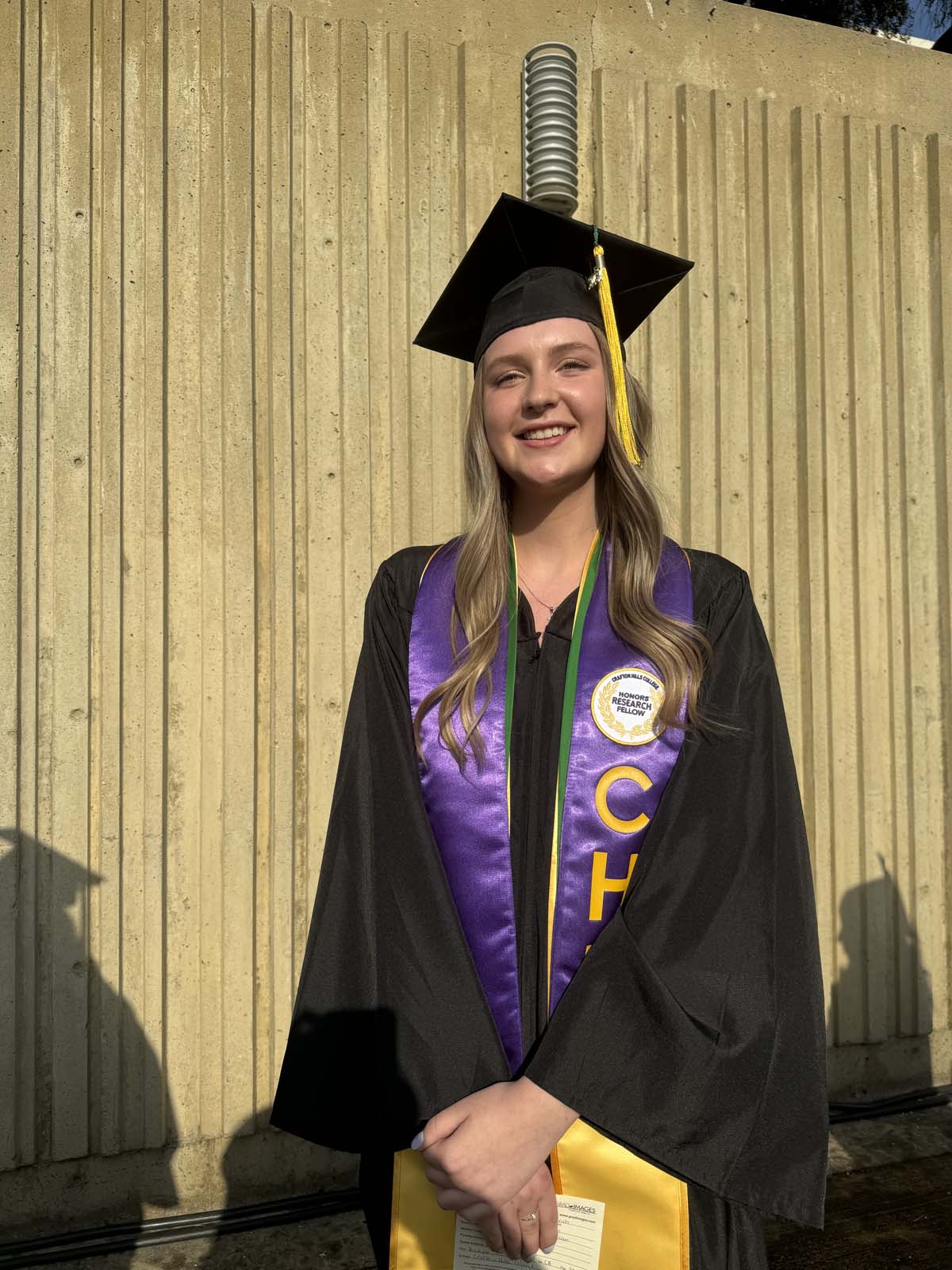 Graduates walk to stage at CHC's Commencement 2024.