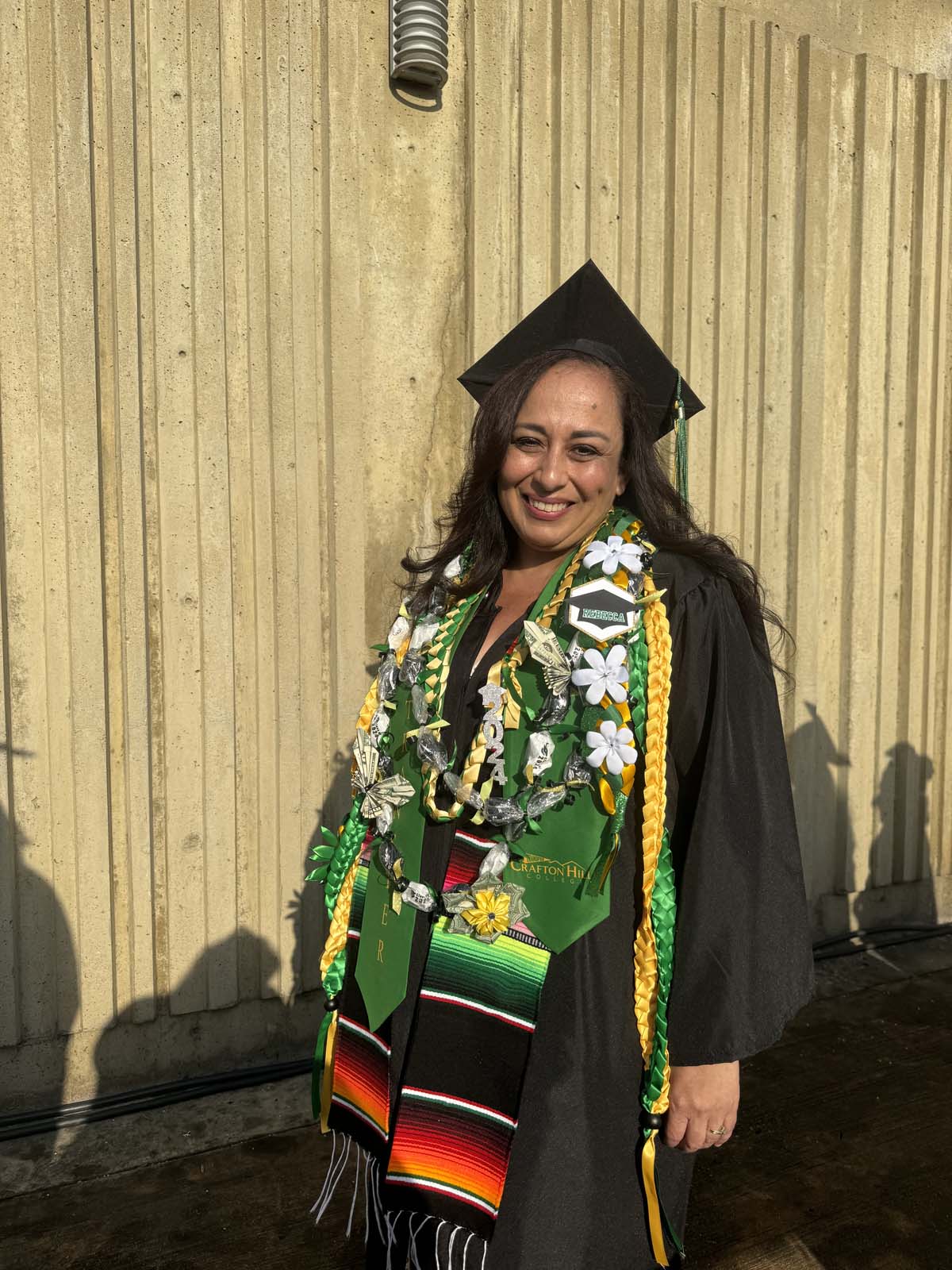 Graduates walk to stage at CHC's Commencement 2024.