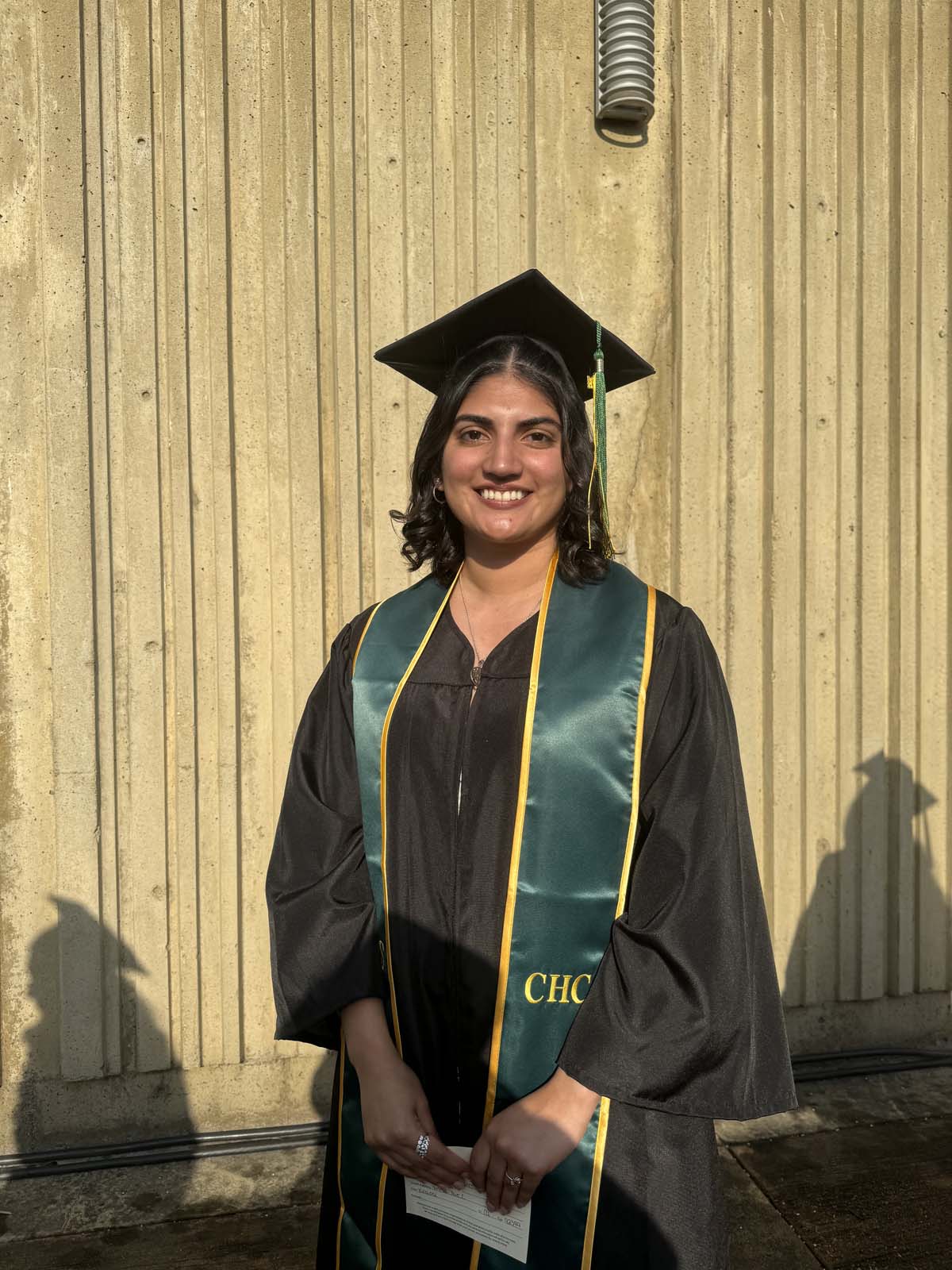 Graduates walk to stage at CHC's Commencement 2024.