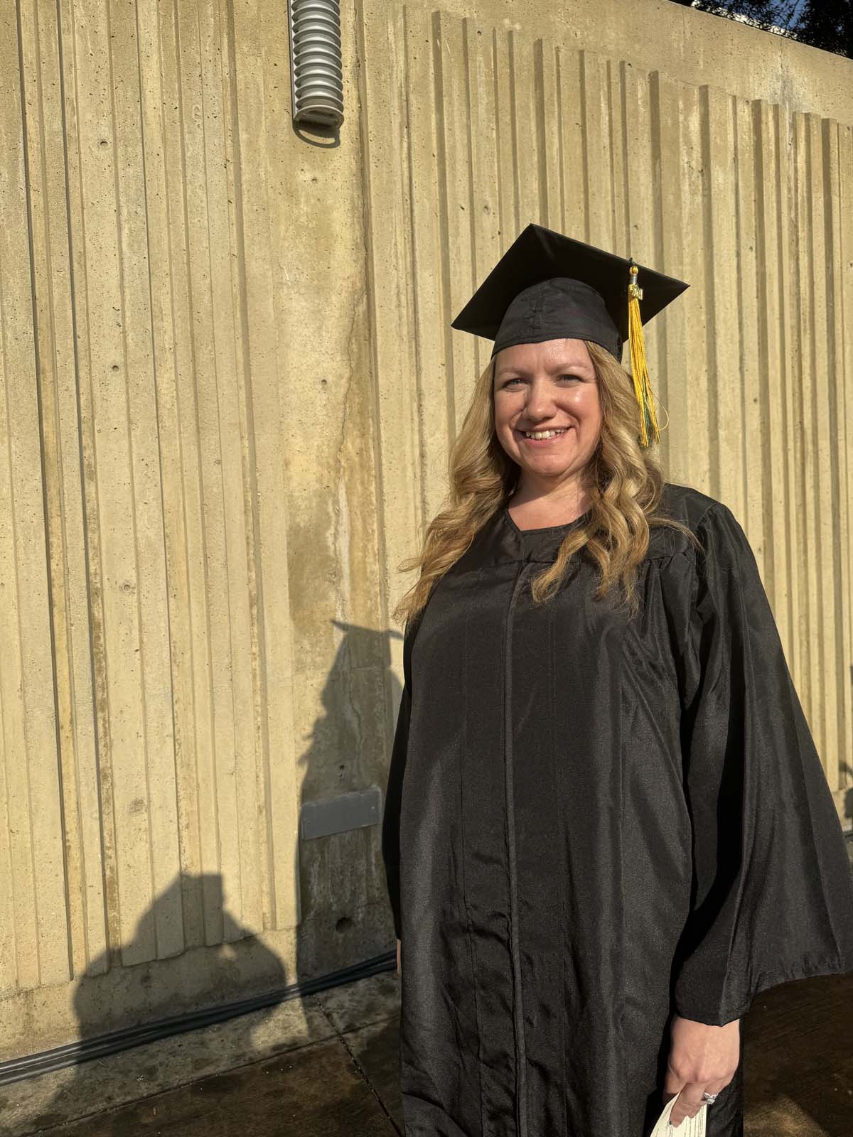 Graduates walk to stage at CHC's Commencement 2024.