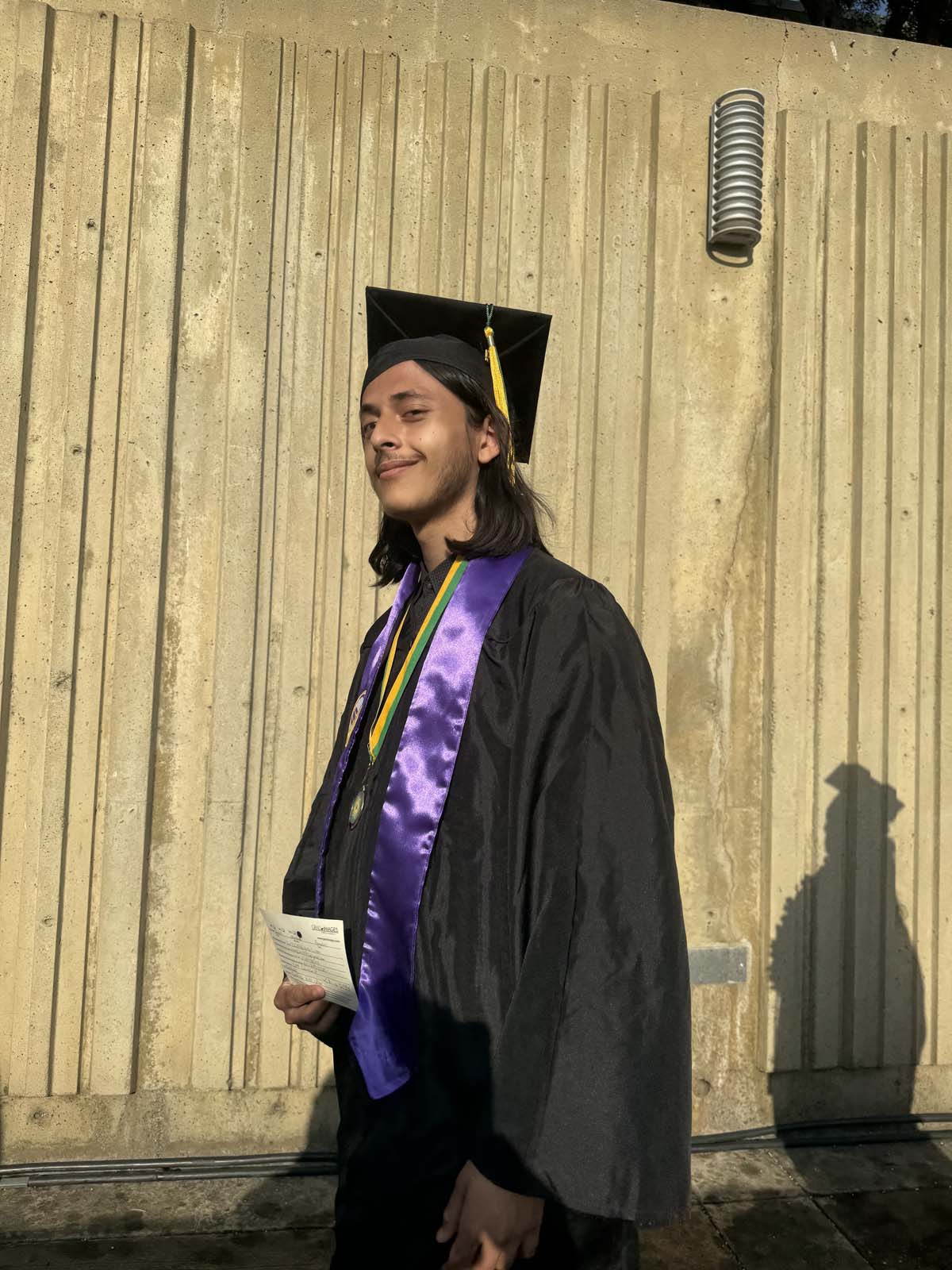 Graduates walk to stage at CHC's Commencement 2024.