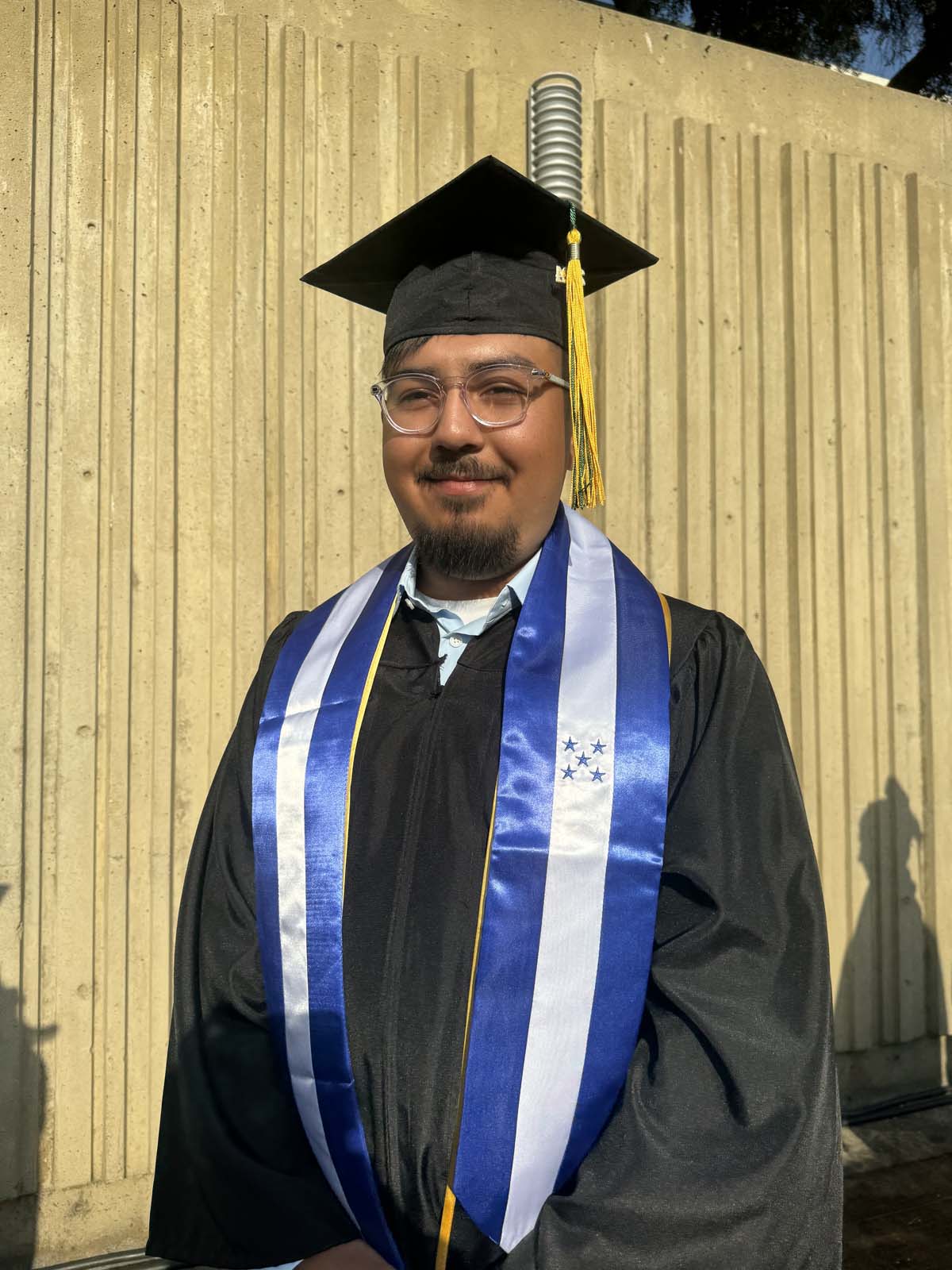 Graduates walk to stage at CHC's Commencement 2024.