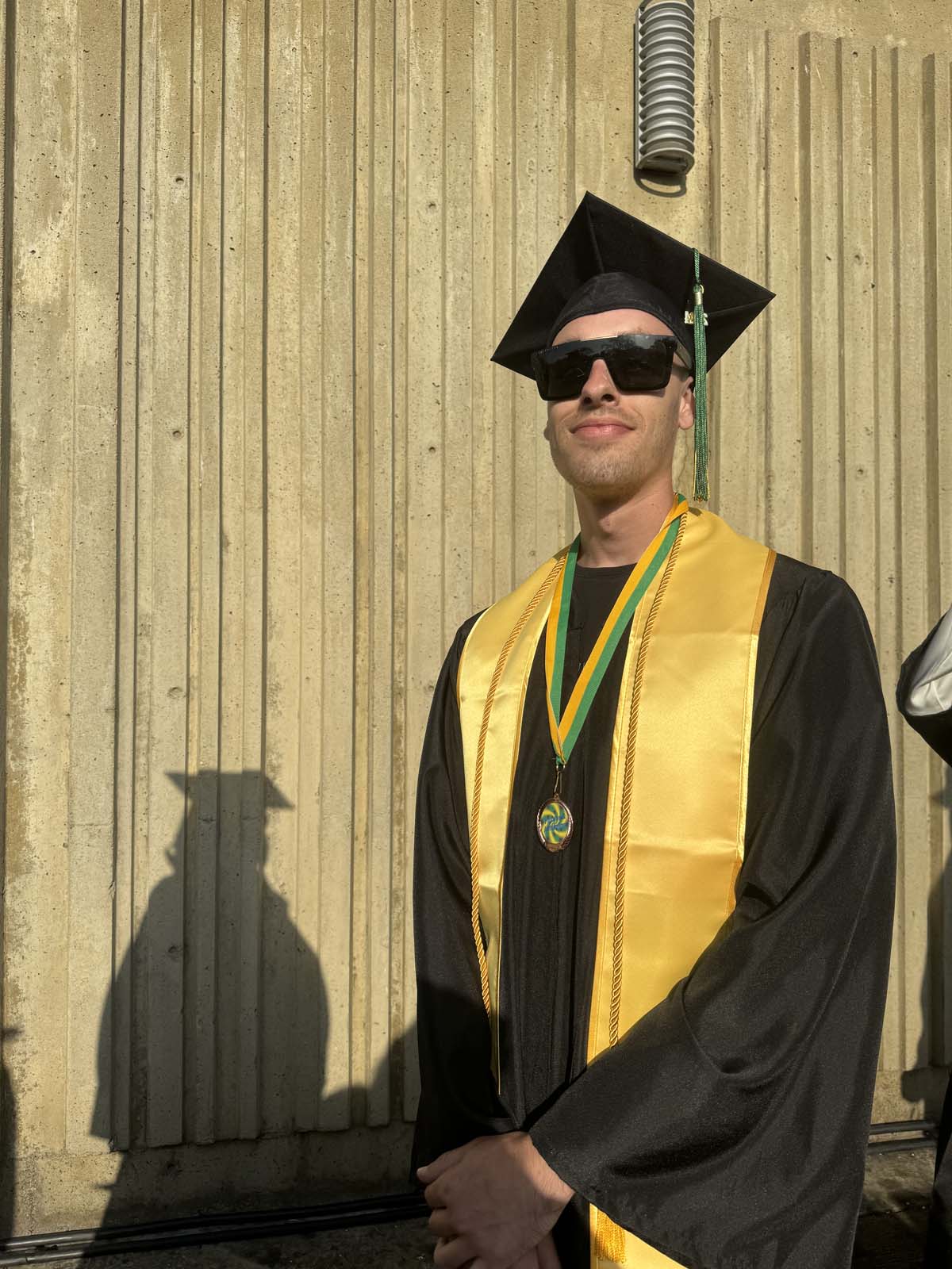 Graduates walk to stage at CHC's Commencement 2024.