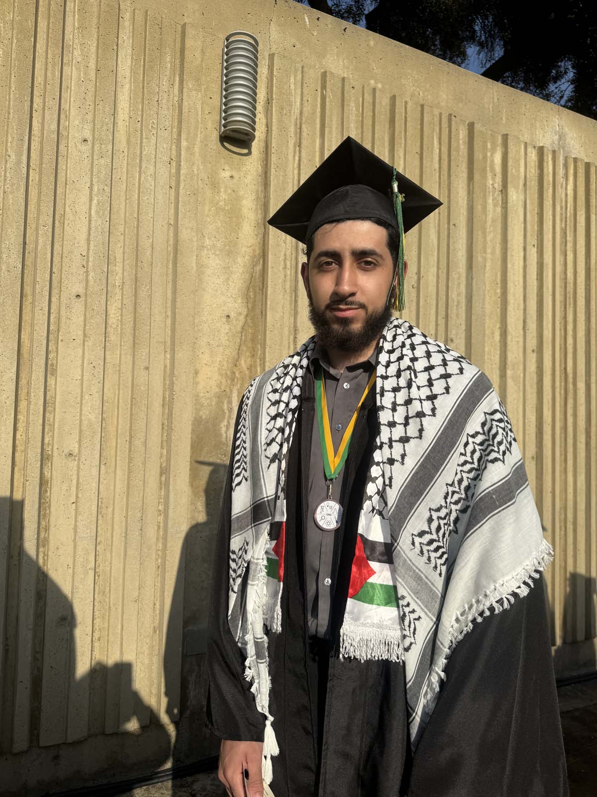 Graduates walk to stage at CHC's Commencement 2024.