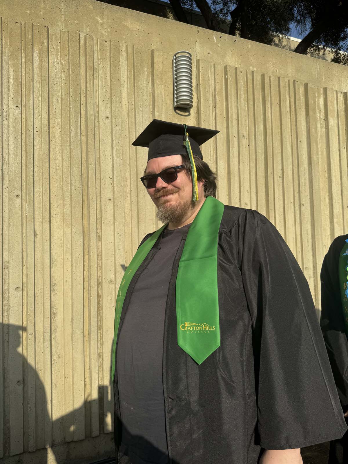 Graduates walk to stage at CHC's Commencement 2024.