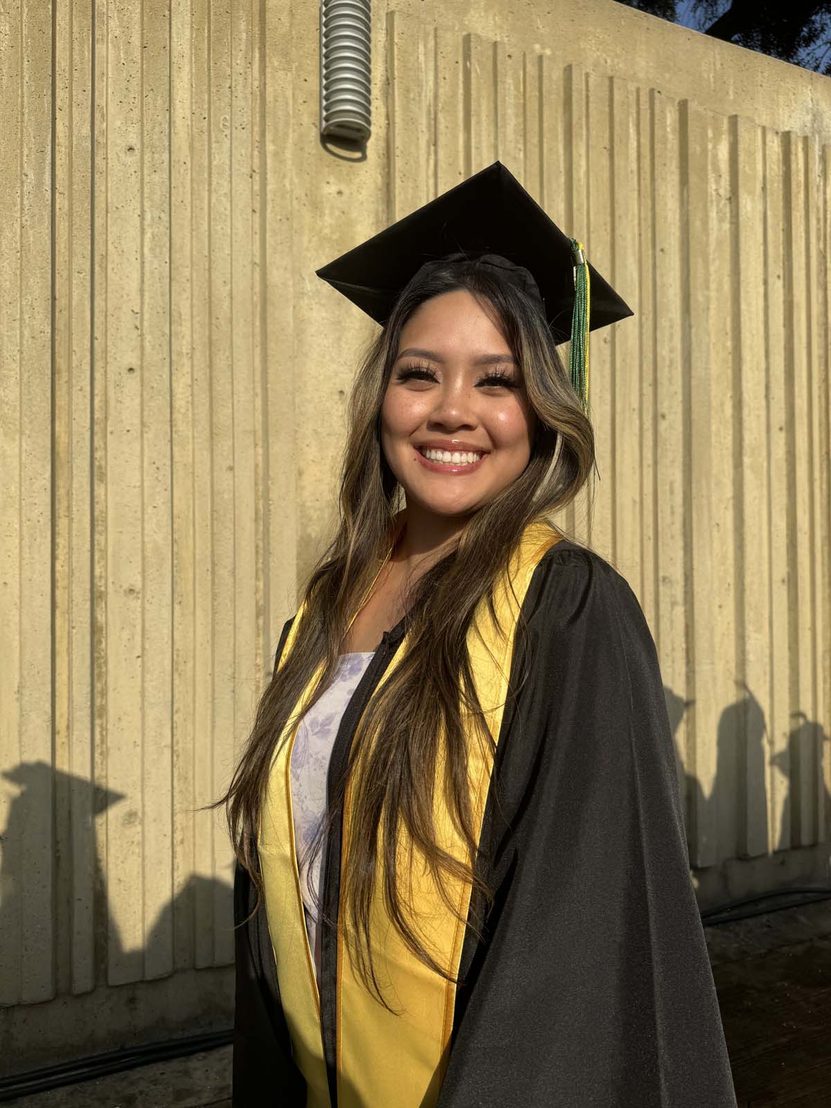 Graduates walk to stage at CHC's Commencement 2024.