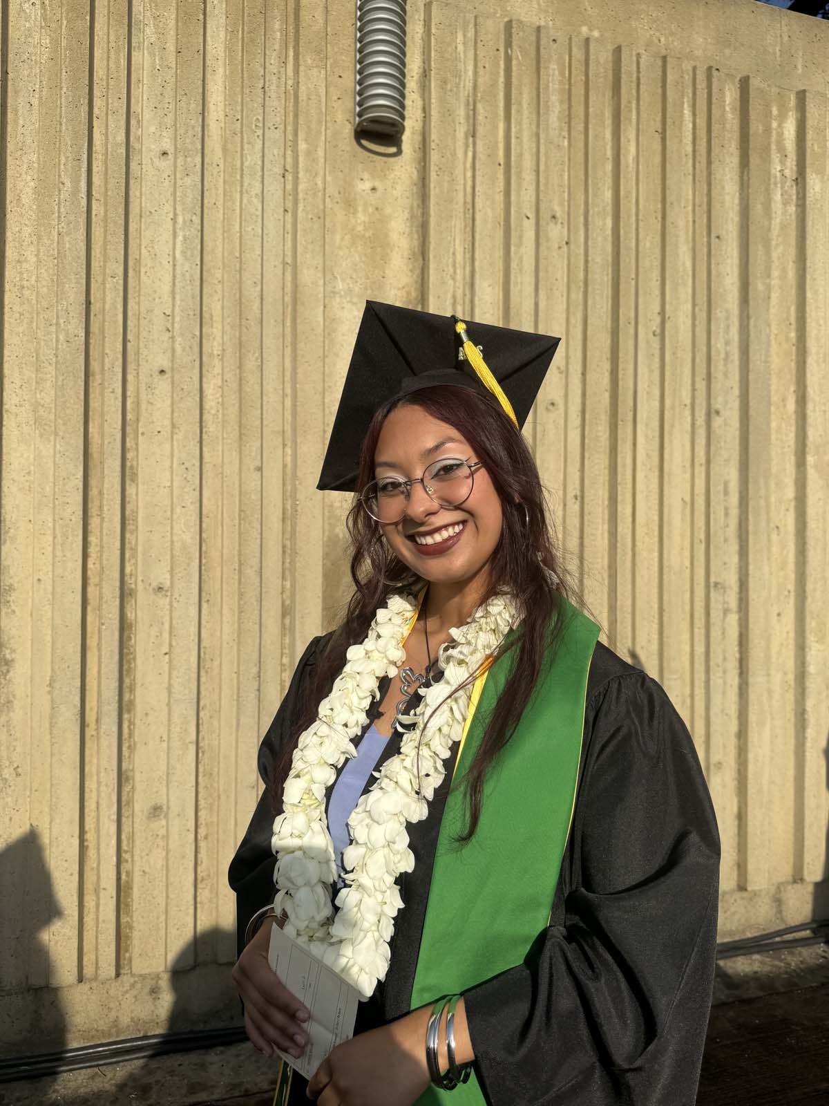 Graduates walk to stage at CHC's Commencement 2024.