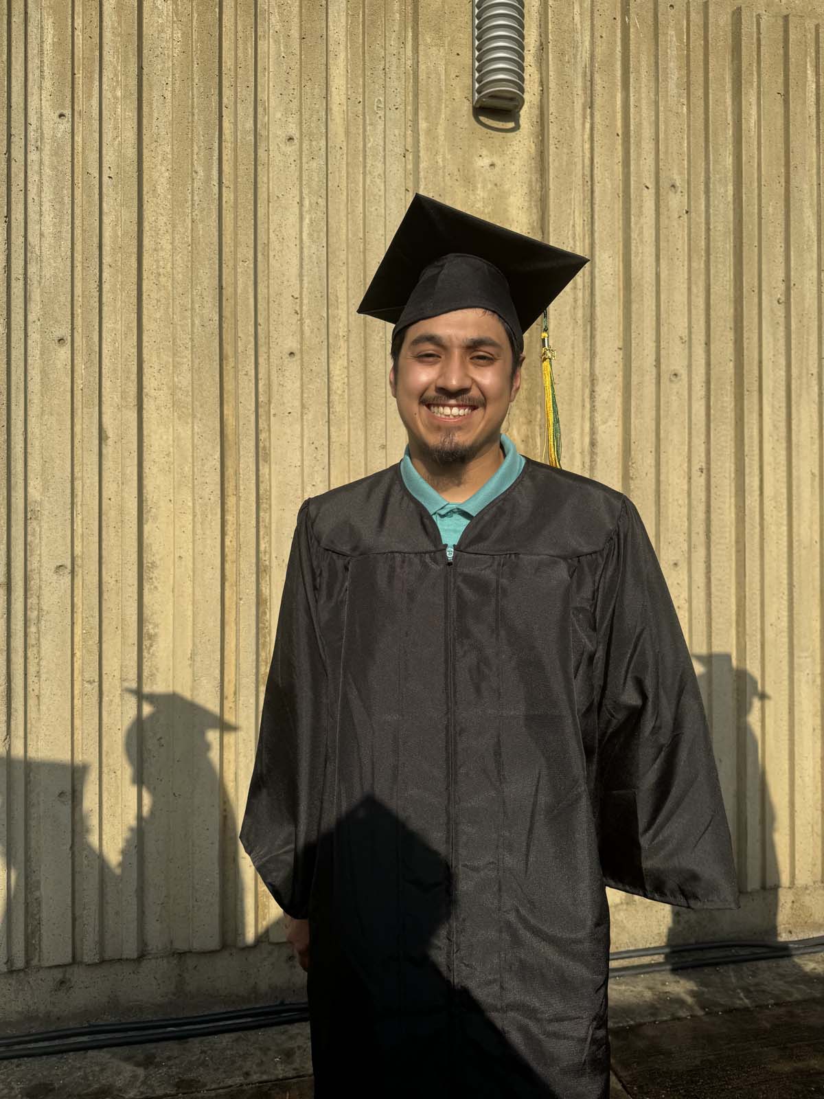 Graduates walk to stage at CHC's Commencement 2024.