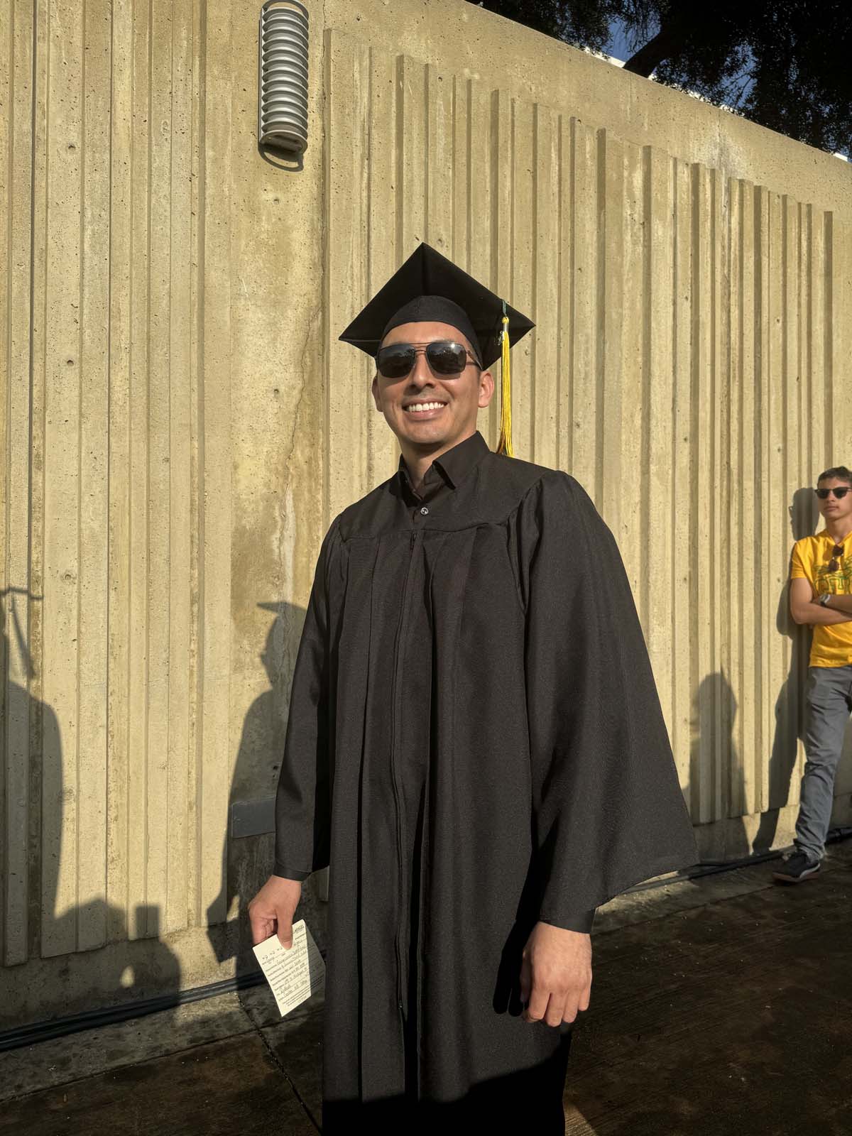 Graduates walk to stage at CHC's Commencement 2024.