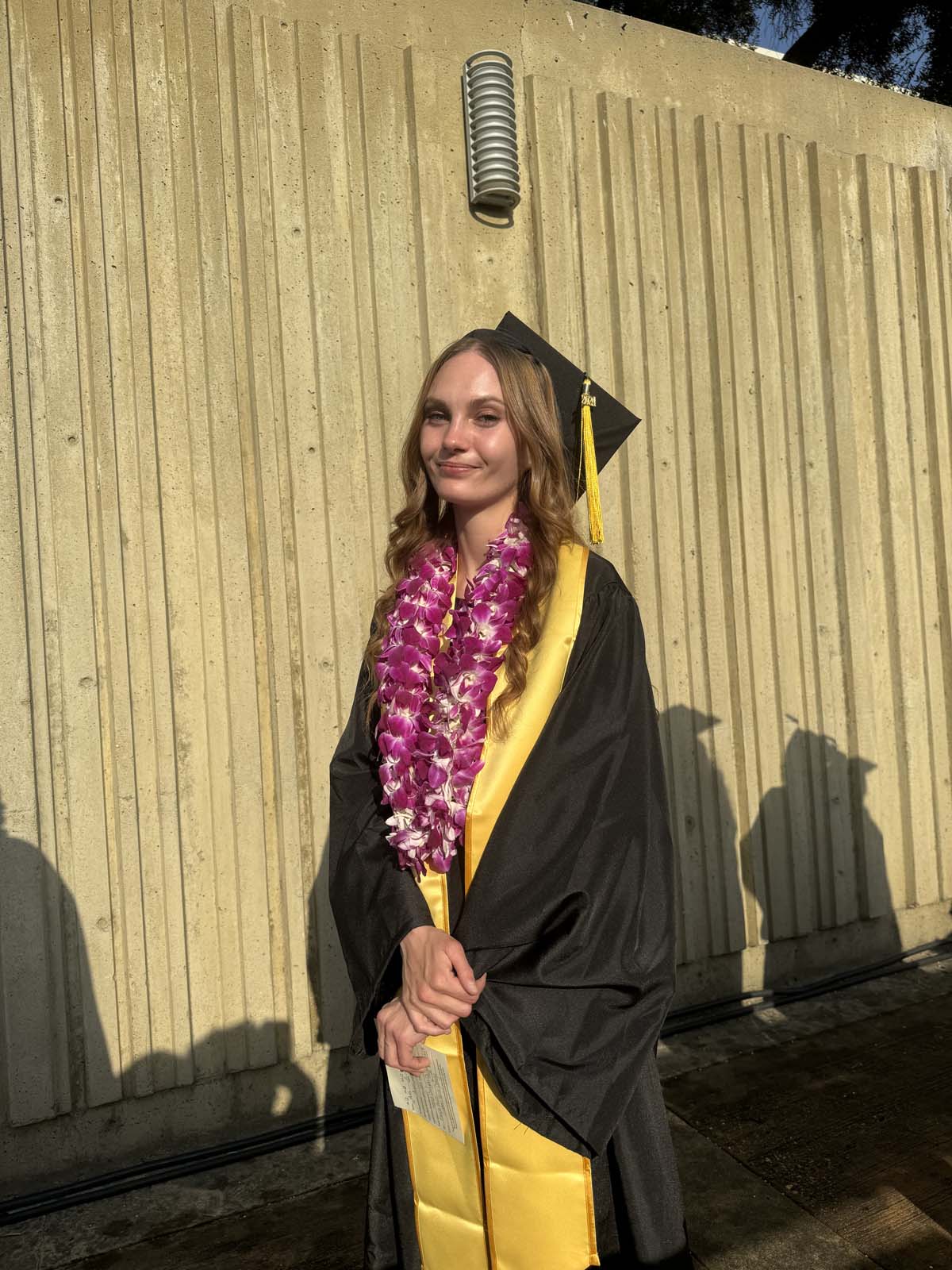 Graduates walk to stage at CHC's Commencement 2024.