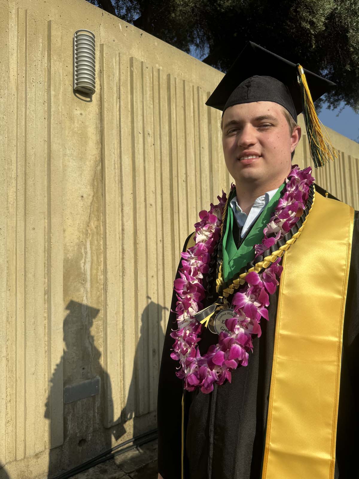 Graduates walk to stage at CHC's Commencement 2024.