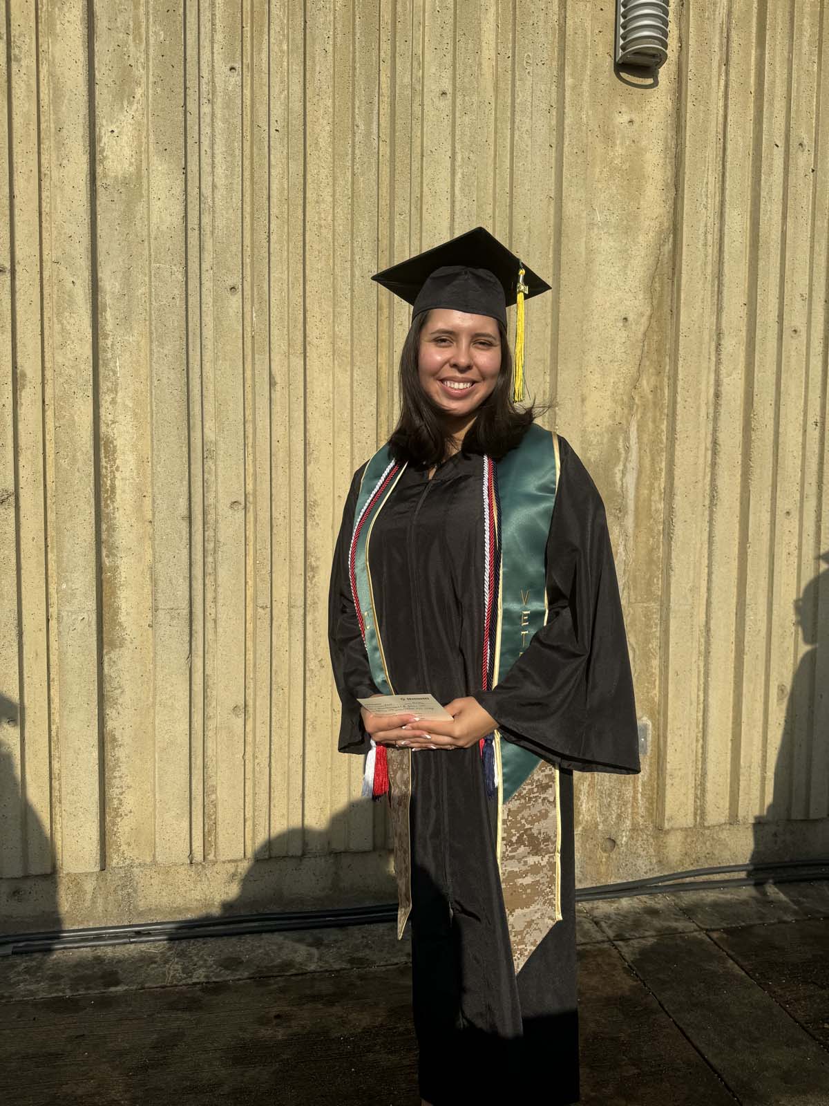 Graduates walk to stage at CHC's Commencement 2024.