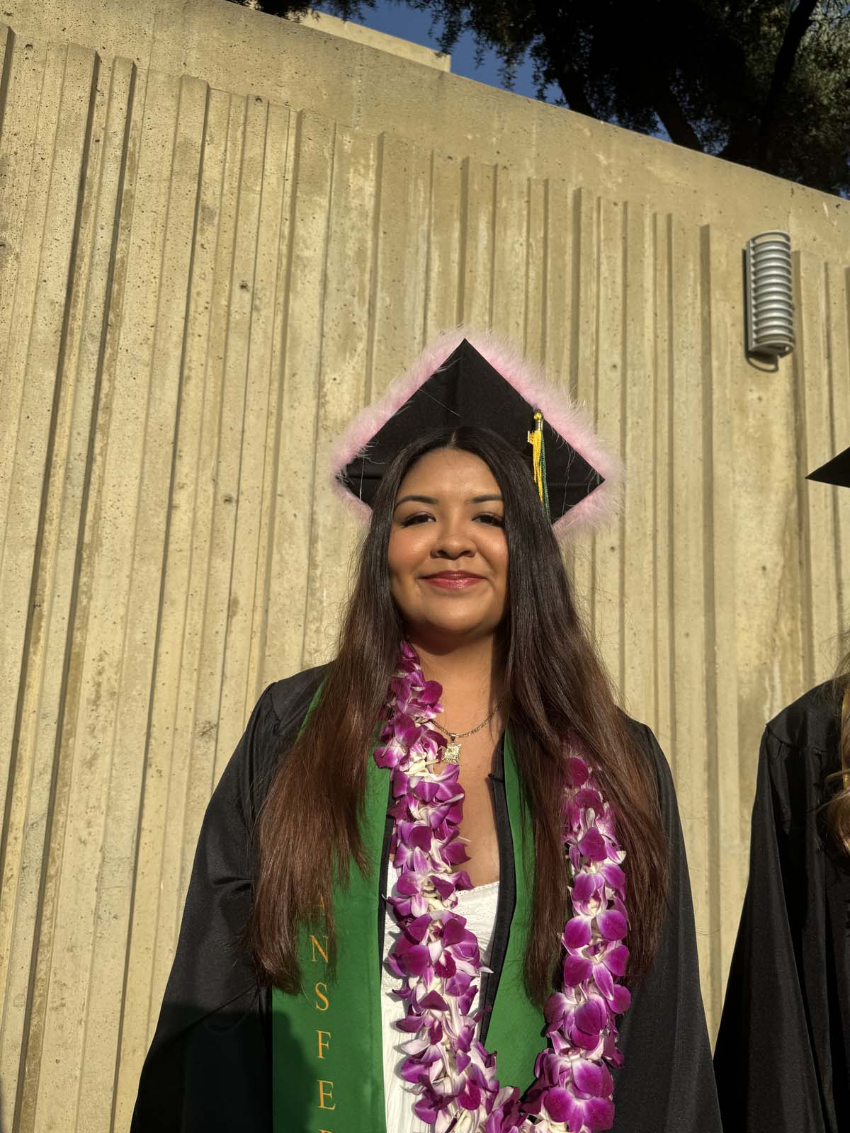 Graduates walk to stage at CHC's Commencement 2024.