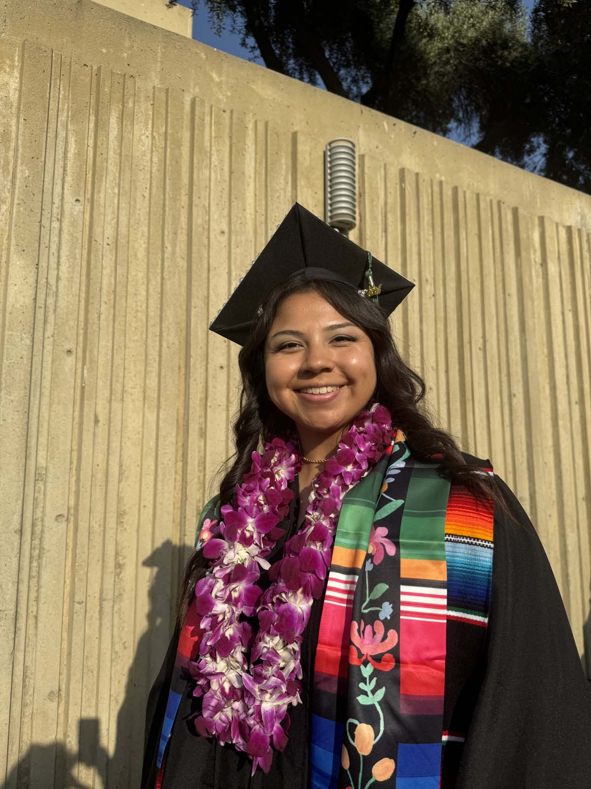 Graduates walk to stage at CHC's Commencement 2024.