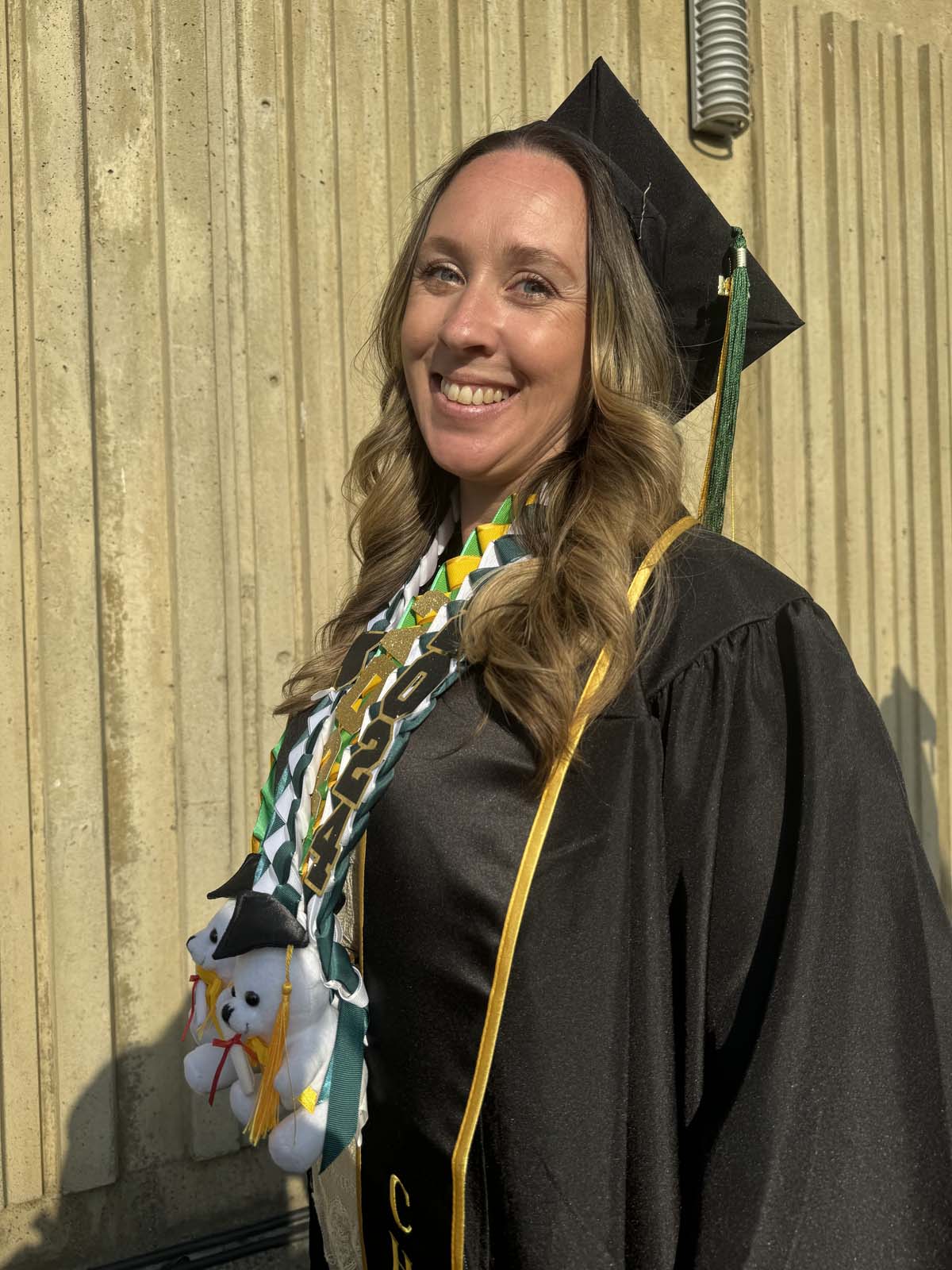 Graduates walk to stage at CHC's Commencement 2024.