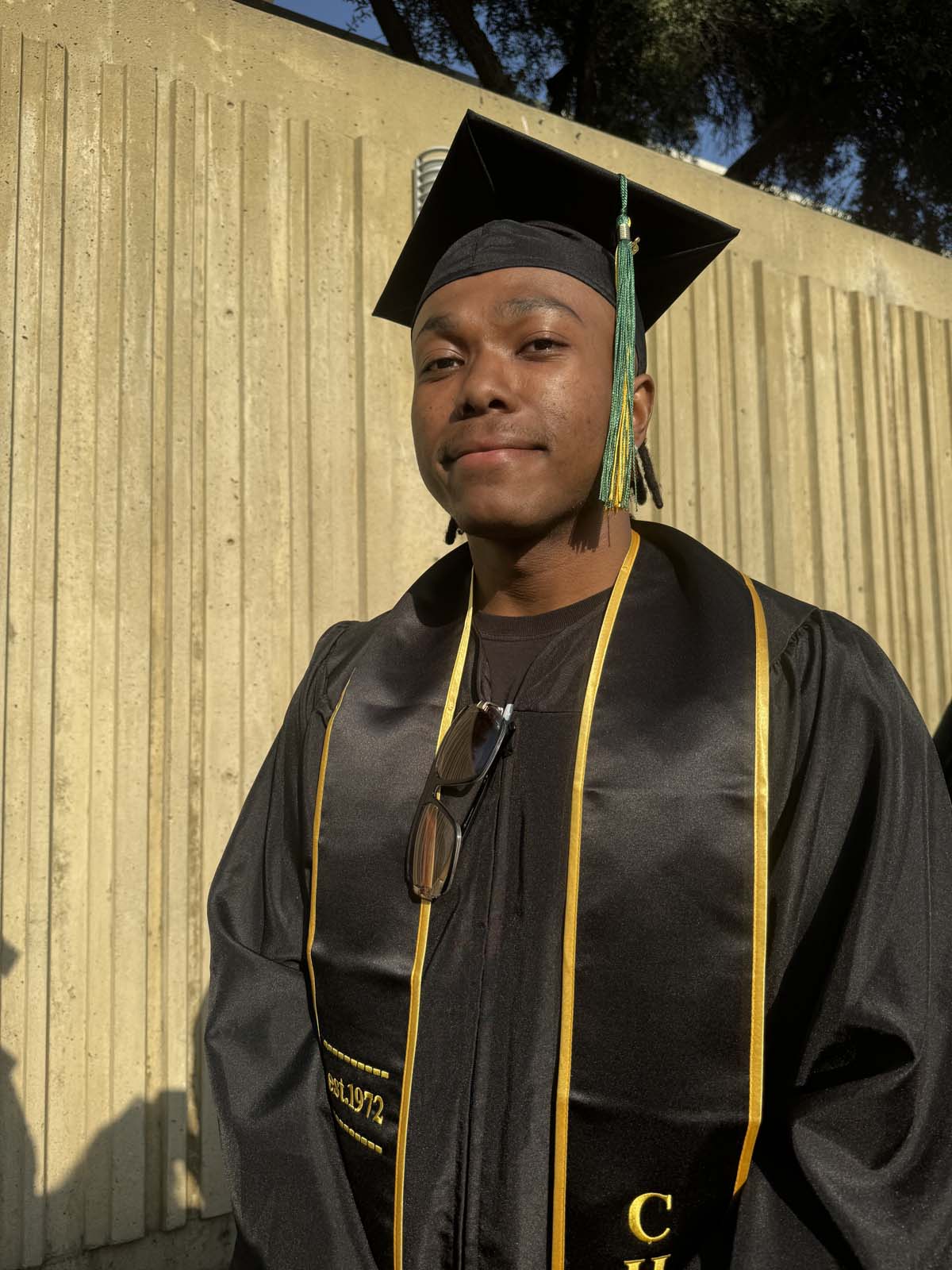 Graduates walk to stage at CHC's Commencement 2024.
