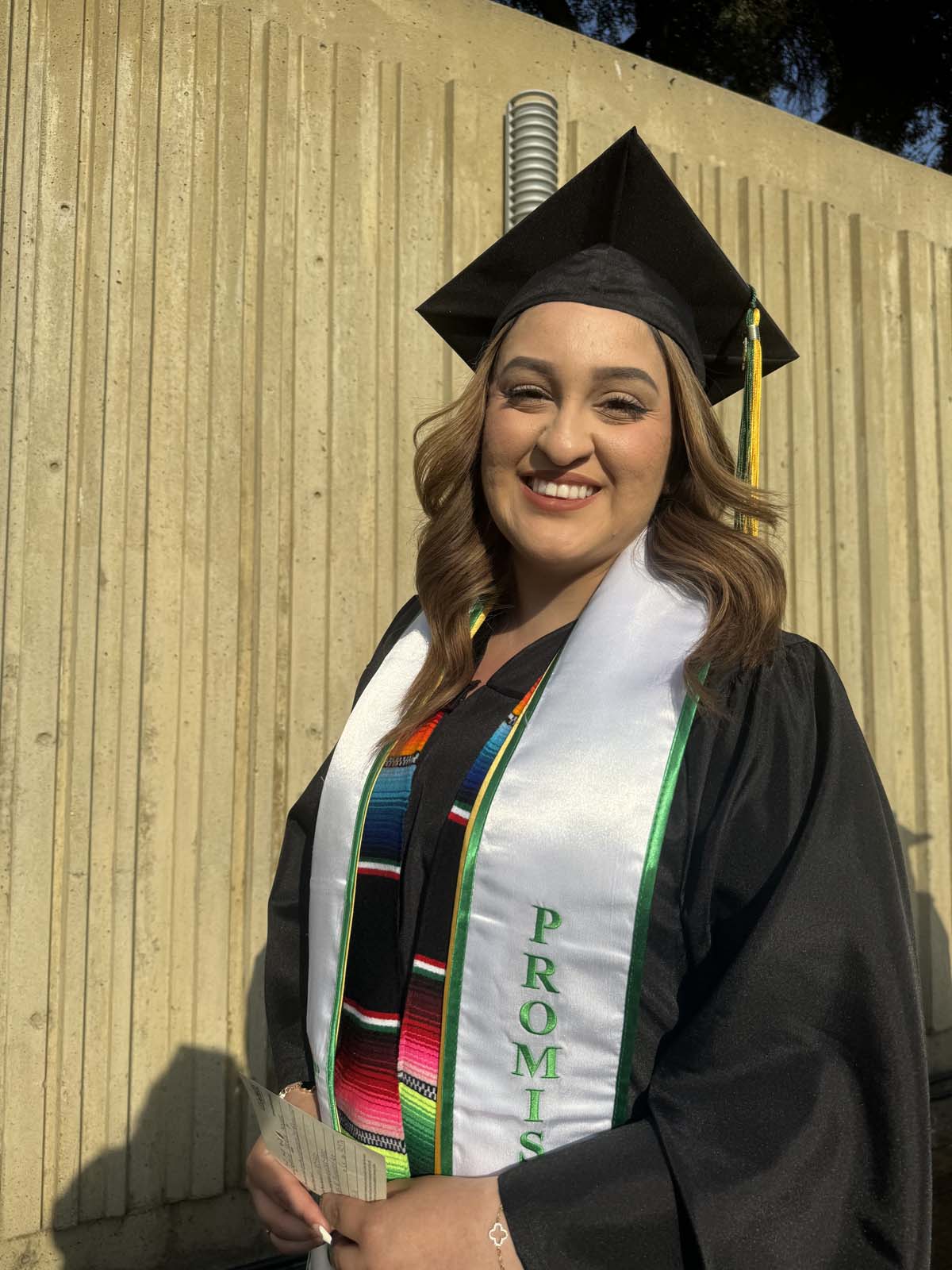 Graduates walk to stage at CHC's Commencement 2024.