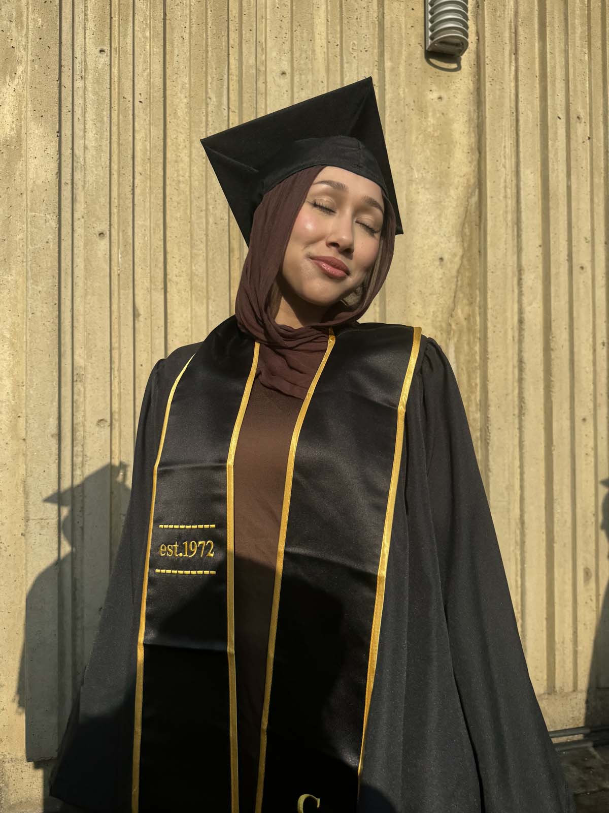 Graduates walk to stage at CHC's Commencement 2024.