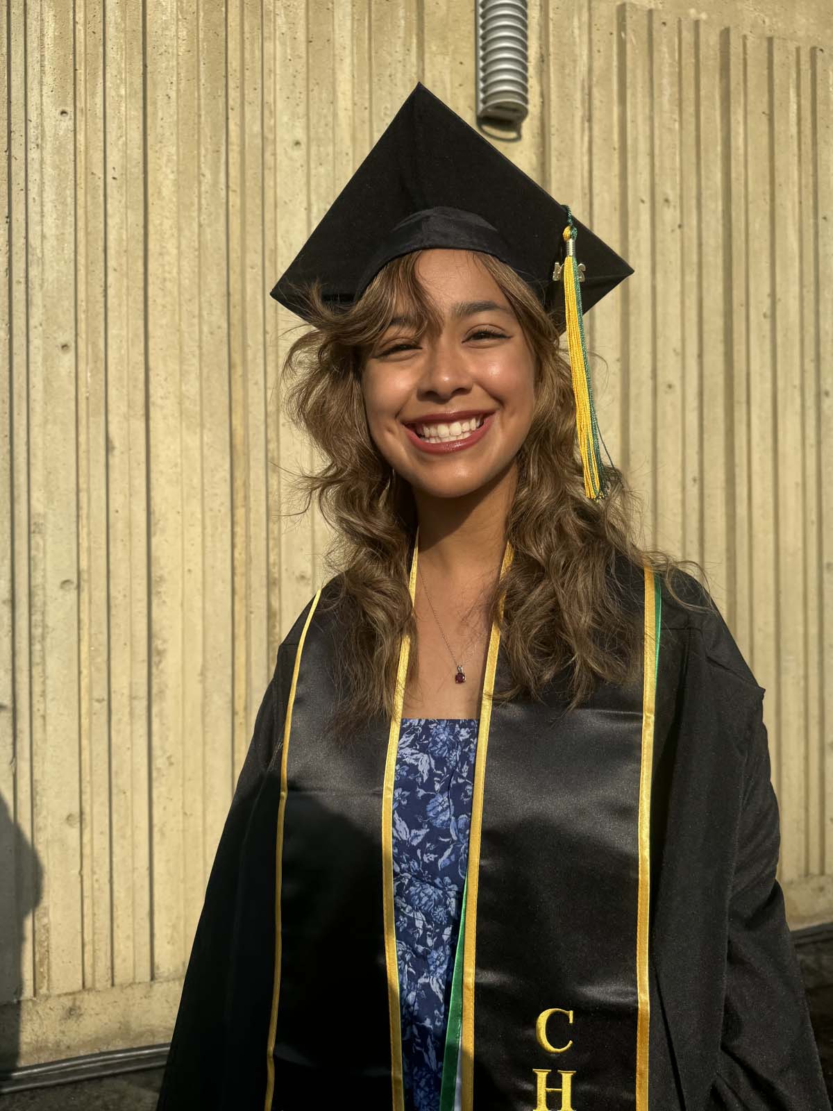 Graduates walk to stage at CHC's Commencement 2024.