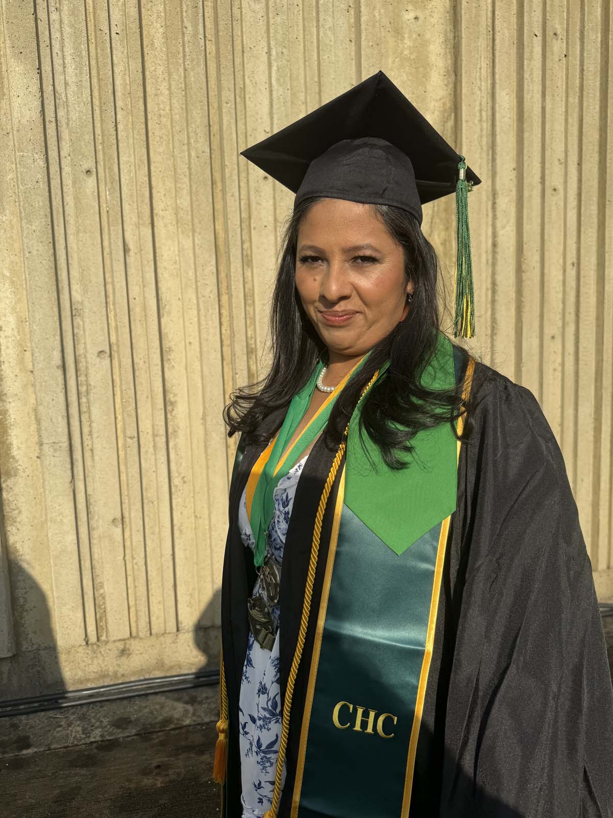 Graduates walk to stage at CHC's Commencement 2024.