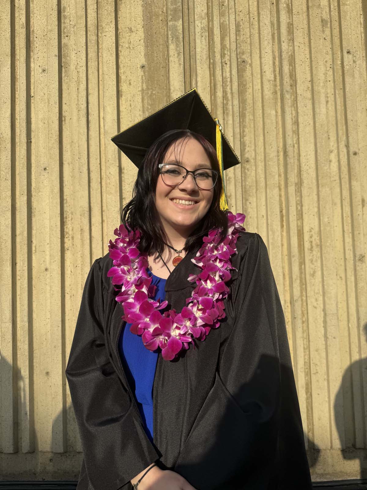 Graduates walk to stage at CHC's Commencement 2024.