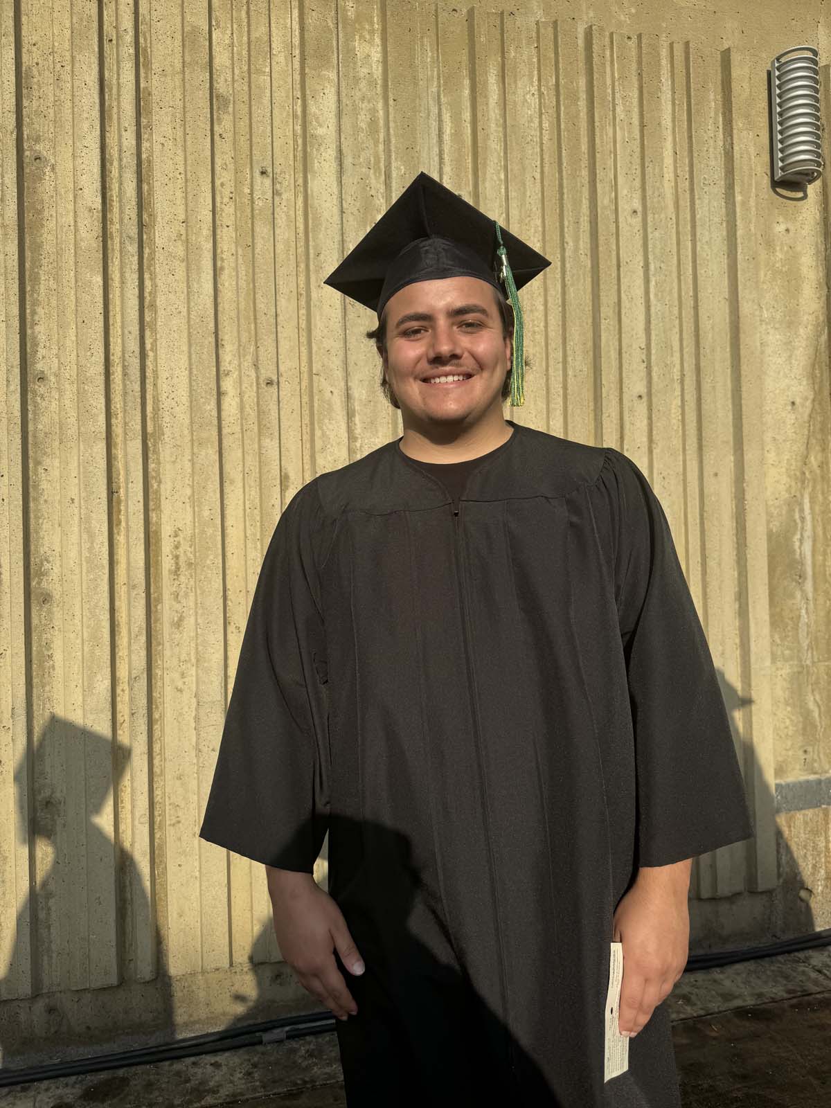 Graduates walk to stage at CHC's Commencement 2024.