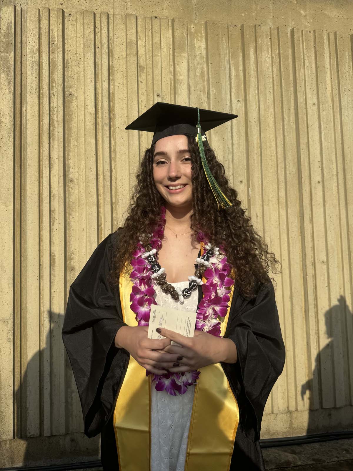 Graduates walk to stage at CHC's Commencement 2024.
