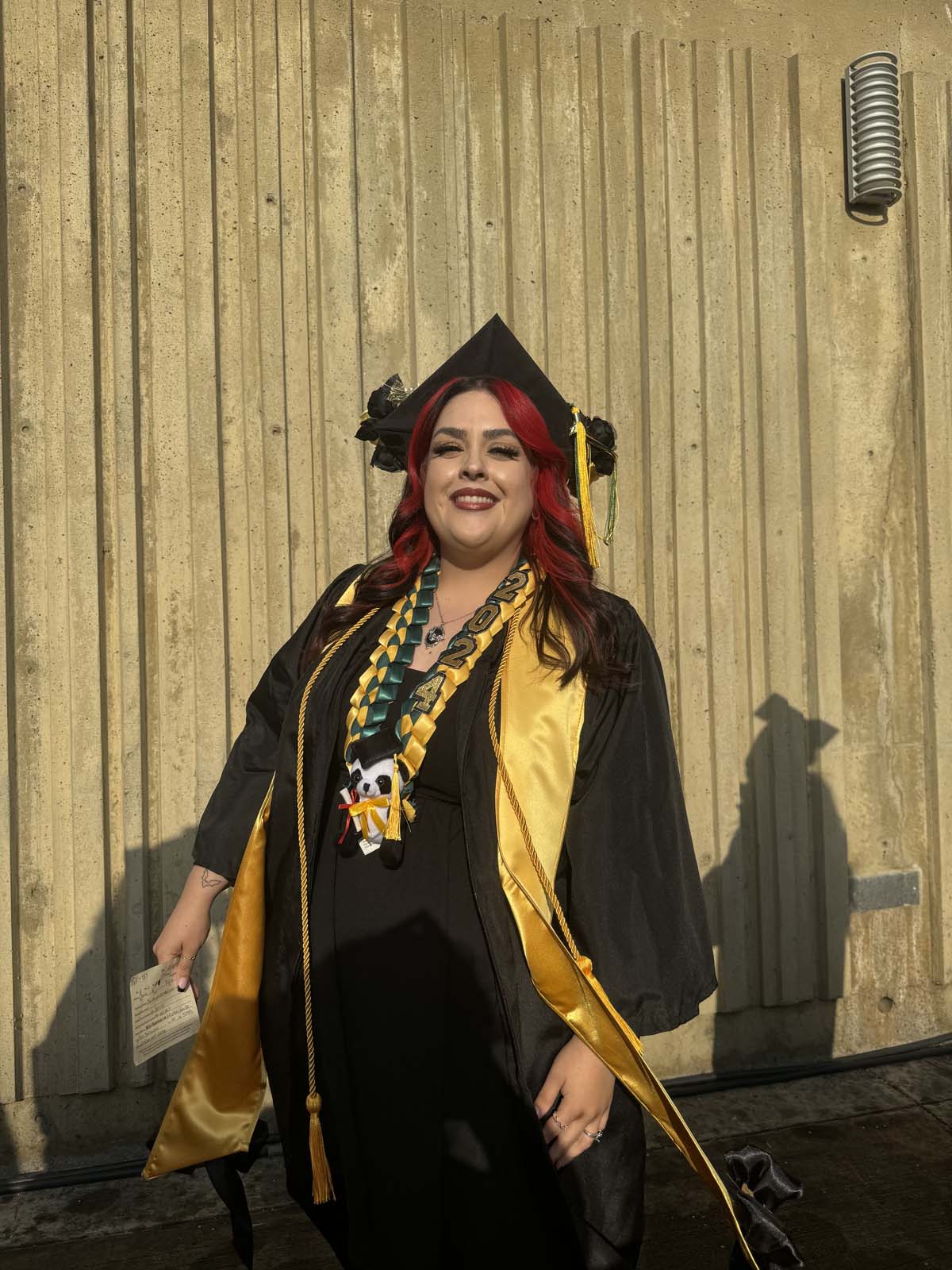 Graduates walk to stage at CHC's Commencement 2024.