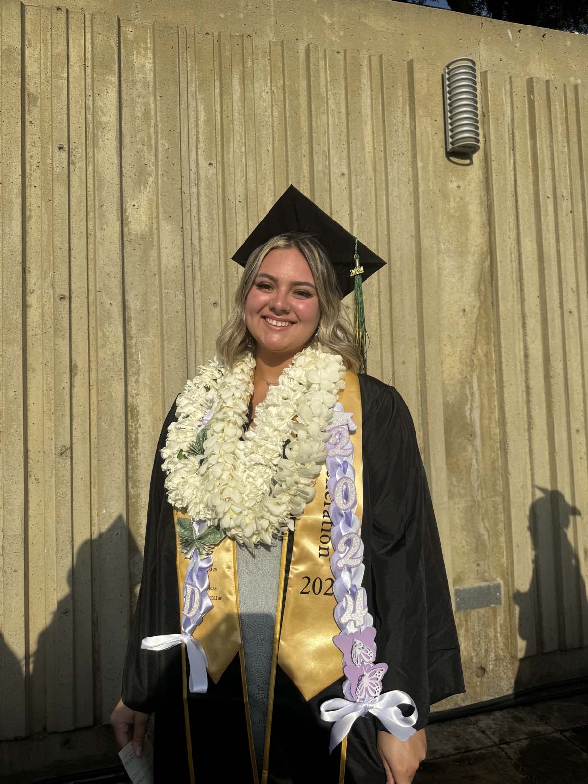 Graduates walk to stage at CHC's Commencement 2024.