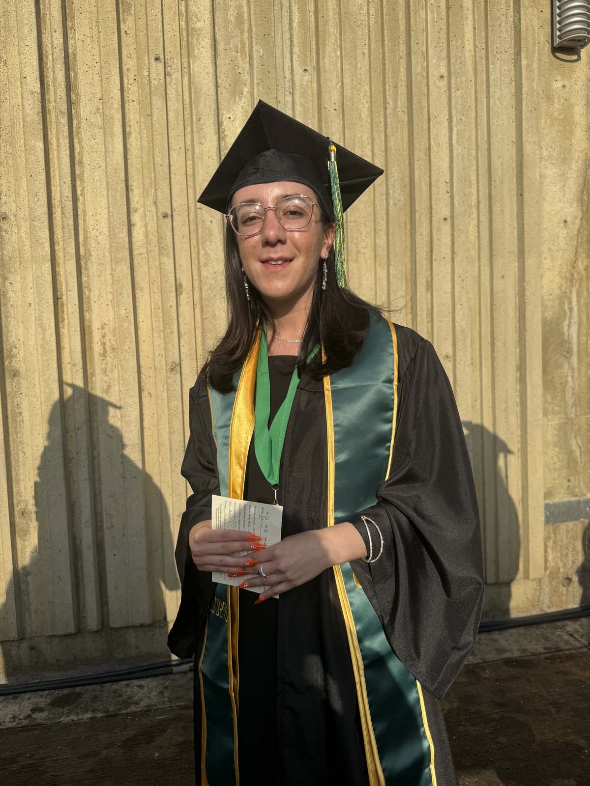 Graduates walk to stage at CHC's Commencement 2024.